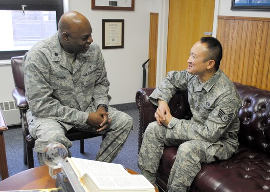 Chaplain (Lt. Col.) Clyde Dyson, 341st Missile Wing chaplain, talks to Staff Sgt. Jack Vudtiyanon, 341st MW chaplain assistant, during an open-forum counseling session on Nov. 19. Dyson recently received the coveted Witherspoon Award. (U.S. Air Force photo/Airman 1st Class Katrina Heikkinen)
