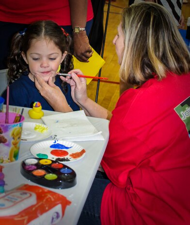 Keona – Grace Lania gets a duck painted on her face Nov. 17, 2012, during the Special Olympics Event at the Joint Base Charleston – Air Base Fitness Center, S.C. The event provided Exceptional Family Member Program  members the opportunity to develop physical fitness skills and make connections with other children. (U.S. Air Force photo / 1st Lt. Jennifer Swann)