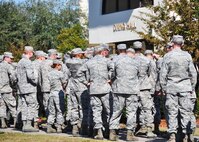 Air Force Reservists queue up outside the dining facility for a traditional Thanksgiving meal at Duke Field, Fla., during the 919th Special Operations Wing’s November unit training assembly. The 919th Force Support Squadron’s DFAC food services team served up hundreds of meals to allow the Citizen Commandos to enjoy turkey and all of the trimmings in advance of the Thanksgiving holiday.  (U.S. Air Force photo/Dan Neely)