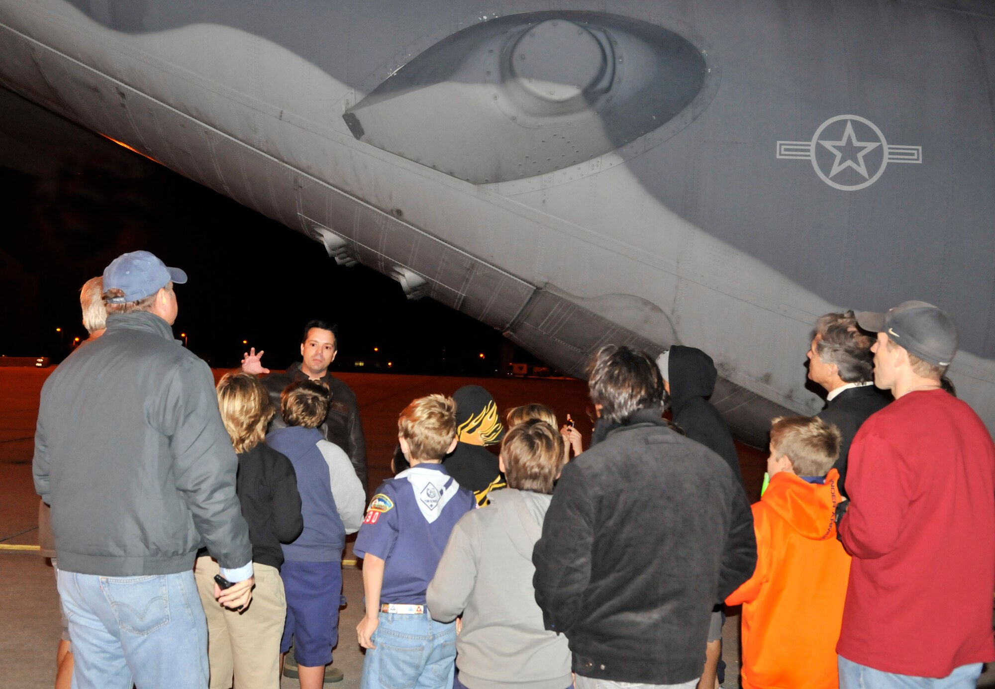 Master Sgt. Shane Smith, 920th Rescue Wing C-130P/N King loadmaster, explains to Cub Scouts the tactical abilities of the King. The 920th Rescue Wing, Patrick AFB, Fla., hosted local Cub Scout Pack 330 for an evening full of high tech gadgets. (U.S. Air Force photo/Tech. Sgt. Peter Dean)