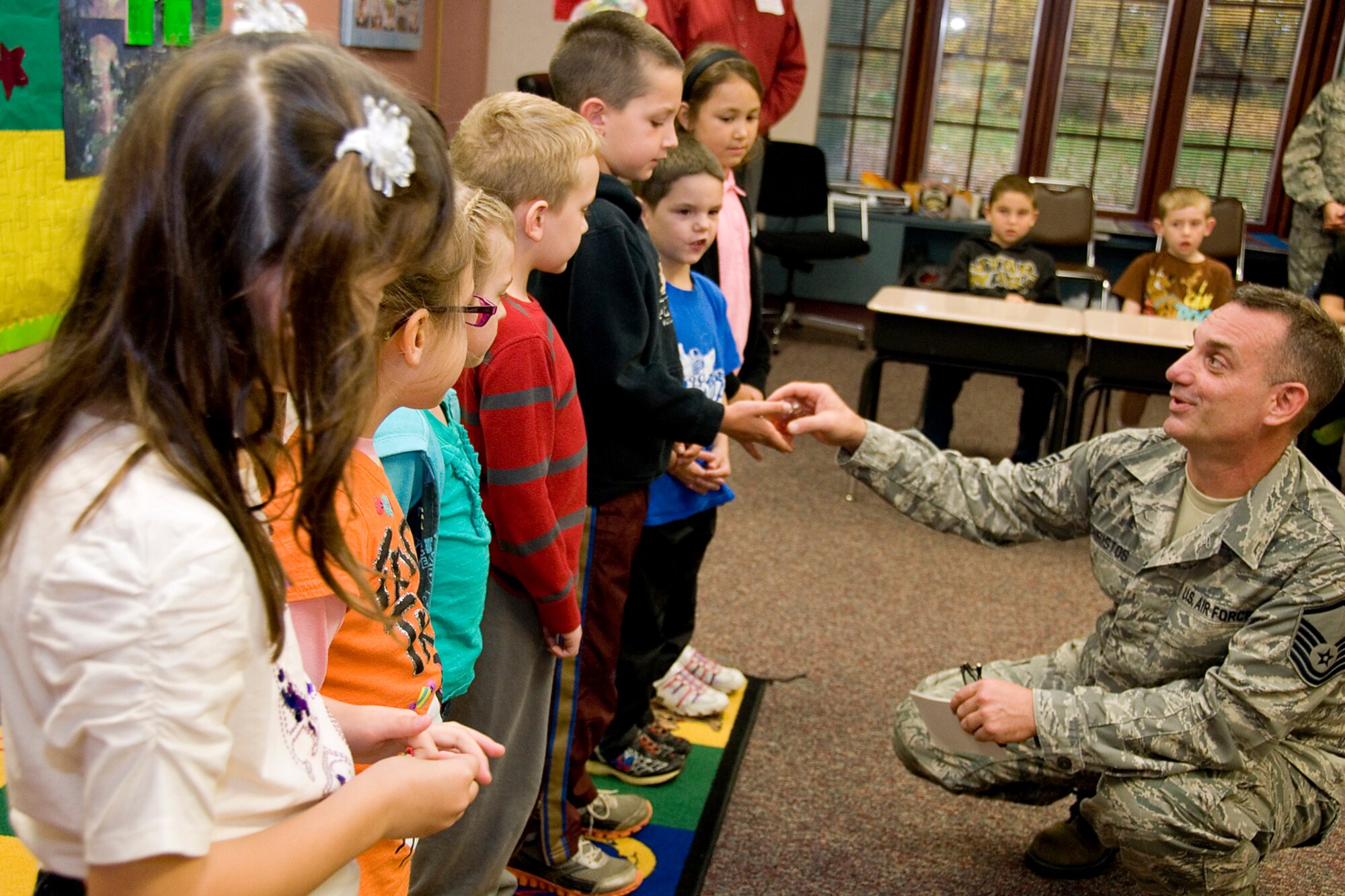 GRISSOM AIR RESERVE BASE, Ind. -- Master Sgt. Nicholas Christos, a health services management journeyman with the 434th Aerospace Medicine Squadron, talks with students at Pipe Creek Elementary during a Red Ribbon Week presentation Oct. 23. (U.S. Air Force Photo/Tech. Sgt. Doug Hays)