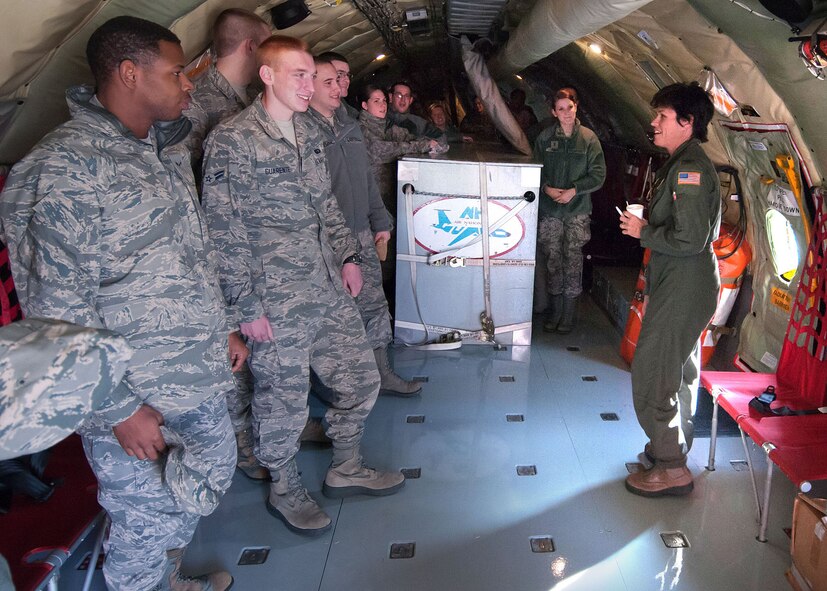 PEASE AIR NATIONAL GUARD BASE, N.H. - Col. Laurie Farris, New Hampshire National Guard director of state operations, speaks with members of the 66th Air Base Group about the New Hampshire Air National Guard refueling mission on board a KC-135 Nov. 15. Active duty Airmen were given an incentive flight on the Air National Guard refueler after an early morning deployment exercise. (U.S. Air Force photo by Rick Berry)