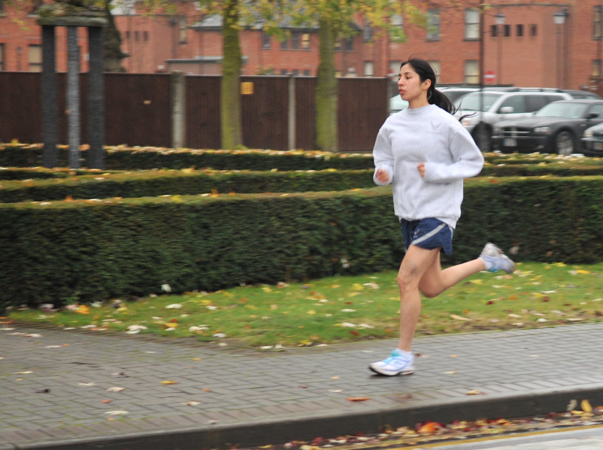 Staff Sgt. Jessica Garcia, 100th Security Forces Squadron, runs Nov. 21, 2012, at RAF Mildenhall, England. Garcia was recently selected for the U.S. Air Forces in Europe cross-country team and ran in the Headquarters Allied Air Command Ramstein Cross-Country Championships Nov. 14 in Amsterdam, the Netherlands. The USAFE female team placed third, competing against European air force teams from the Netherlands, Belgium, Germany, Poland and the United Kingdom. (U.S. Air Force photo by Senior Airman Jerilyn Quintanilla/Released)