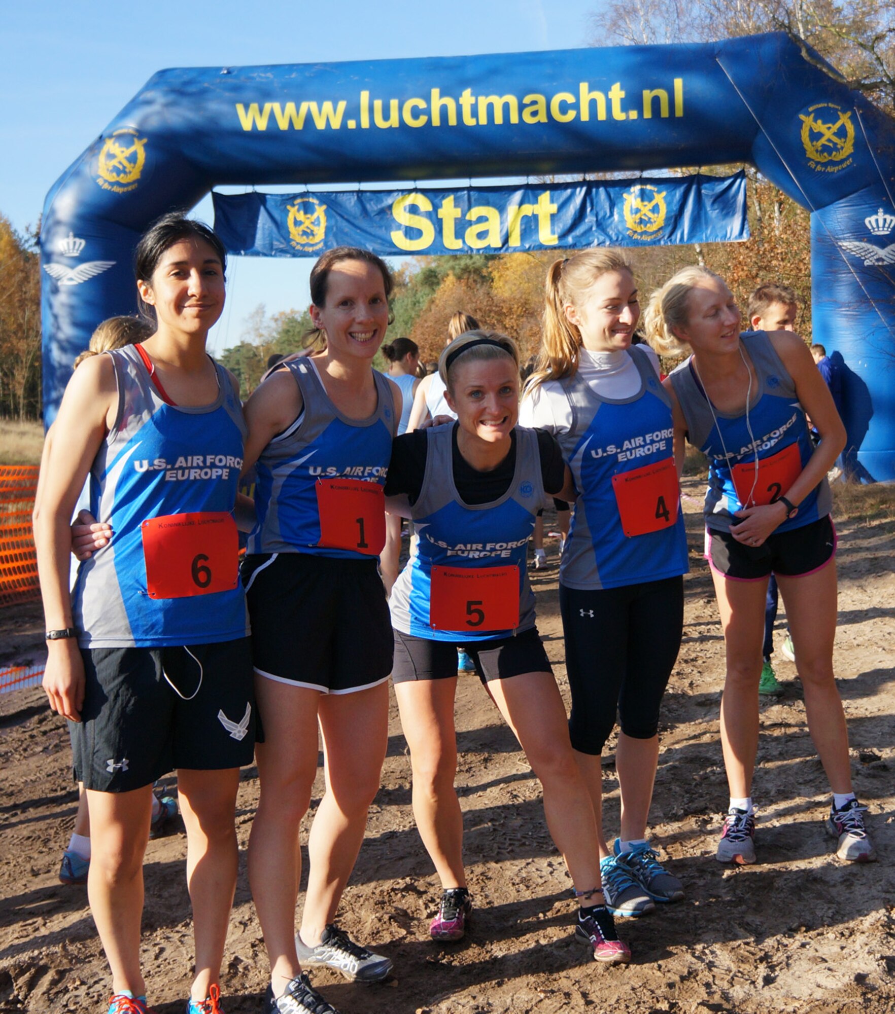 Members of the U.S. Air Forces in Europe female cross-country team, from left, Staff Sgt. Jessica Garcia, RAF Mildenhall; Capt. Elissa Ballas, Ramstein Air Base, Germany; Tech. Sgt. Jessica Pigott, Aviano Air Base, Italy; 2nd Lt. Reanna Lachner, RAF Lakenheath; and Capt. Kimberly Caldwell, Incirlik Air Base, Turkey, pose for a photo after they placed third at the Headquarters Allied Air Command Ramstein Cross-Country Championships Nov. 14, 2012, in Amsterdam, the Netherlands. Garcia, 100th Security Forces Squadron, placed 13th out of 30 for individual times. (Courtesy photo)