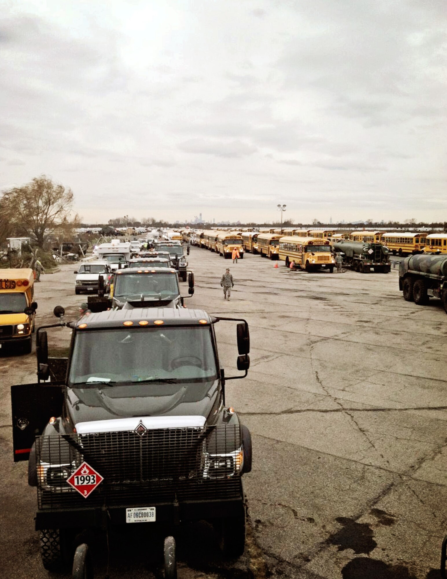 The Massachusetts Air National Guard, along with the Army National Guard, provided a series of C-300 fuel trucks, which can hold 1,200 gallons of fuel and are capable of dispensing gasoline directly into vehicles. Approximately 350,000 gallons of fuel, provided by FEMA, were distributed to about 12,000 vehicles at the Floyd-Bennett Field, N.Y., in the aftermath of Hurricane Sandy. (National Guard photo by Senior Master Sgt. Tom Orifice/Released)