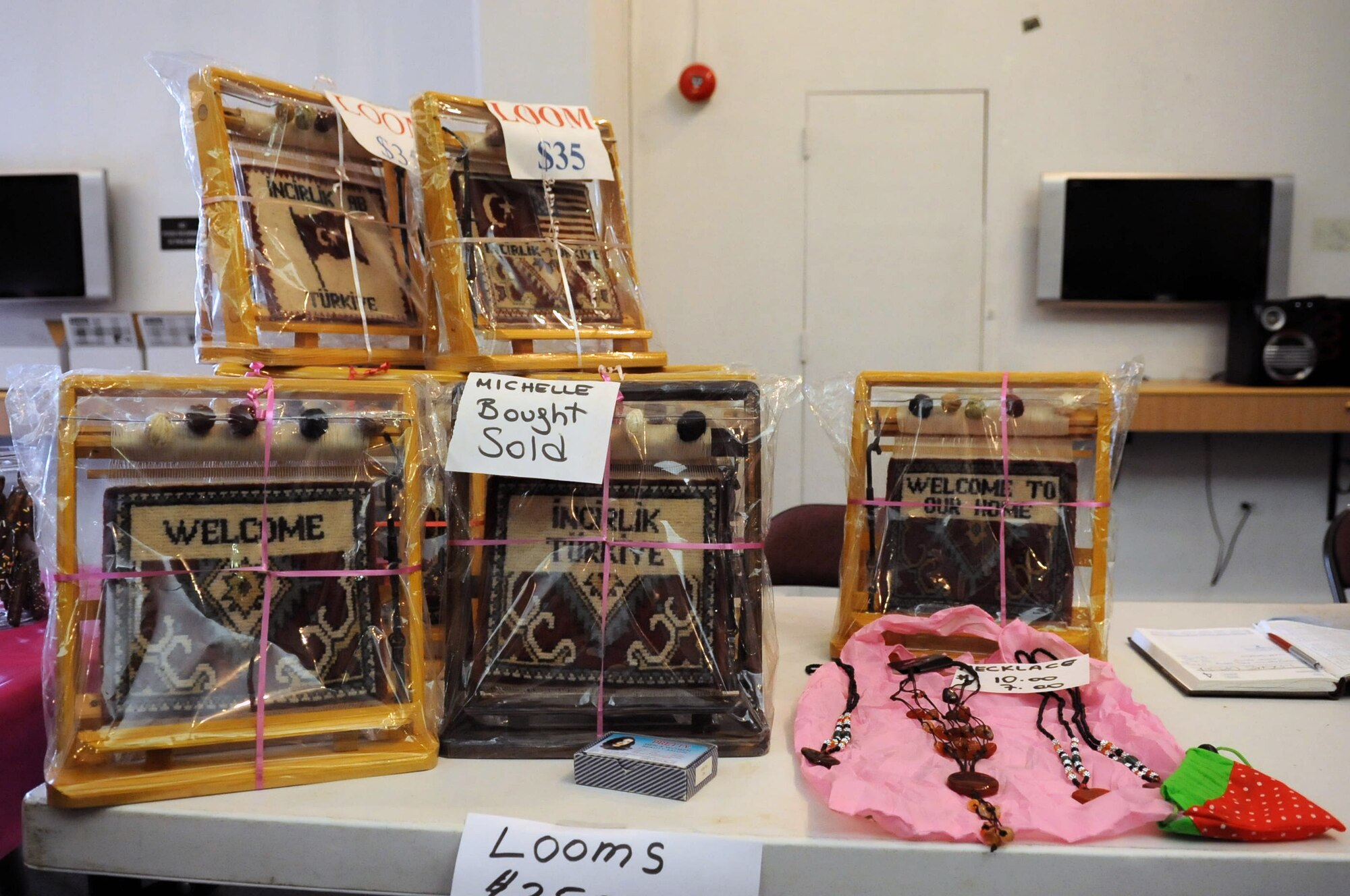 Hand-made looms are displayed and for sale at the community center's holiday bazaar Nov. 17, 2012 at Incirlik Air Base, Turkey. Incirlik members visited the event to see what other members of the community had to offer. (U.S. Air Force photo by Senior Airman Daniel Phelps/Released)