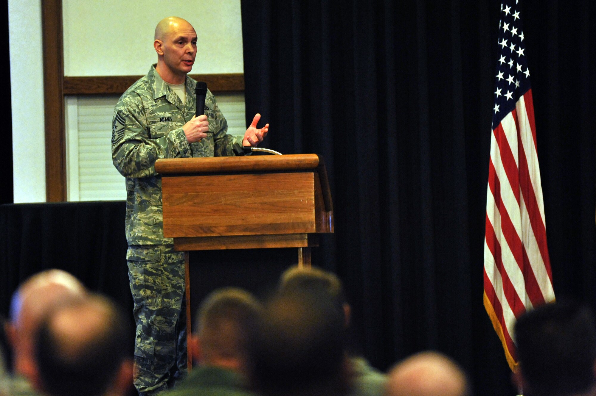 United States Air Forces in Europe and Air Forces Africa Command Chief Master Sgt. Craig A. Adams addresses USAFE headquarters staff during his first USAFE-AFAFRICA All Call at Ramstein Air Base Nov. 13. (U.S. Air Force photo/Senior Airman Caitlin O'Neil-McKeown)

