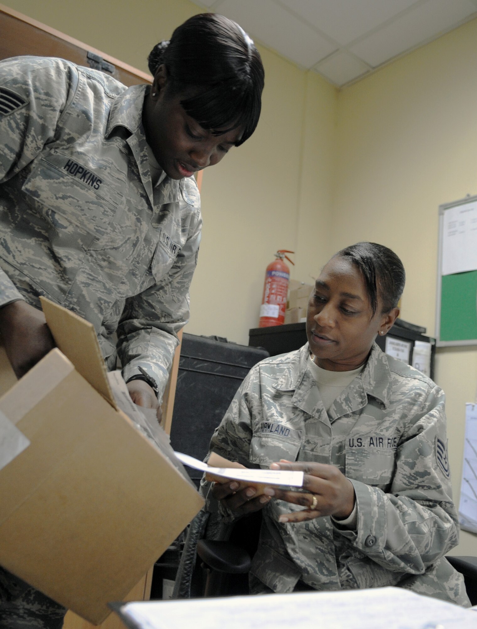 SOUTHWEST ASIA – Staff Sgt. Keisha Hopkins and Tech. Sgt. Monica Kirkland, 386th Expeditionary Aircraft Maintenance Squadron decentralize supply support managers, reviews an order they placed for a C-130 Hercules aircraft part here Nov. 20. Hopkins and Kirkland are part of a four-person shop. Each person order at least 10 parts a day, making sure the aircraft stays in the air. Hopkins and Kirkland are assigned to the 165th Airlift Wing, Savannah Air National Guard, Ga. (U.S. Air Force photo/Staff Sgt. Alexandra M. Boutte)