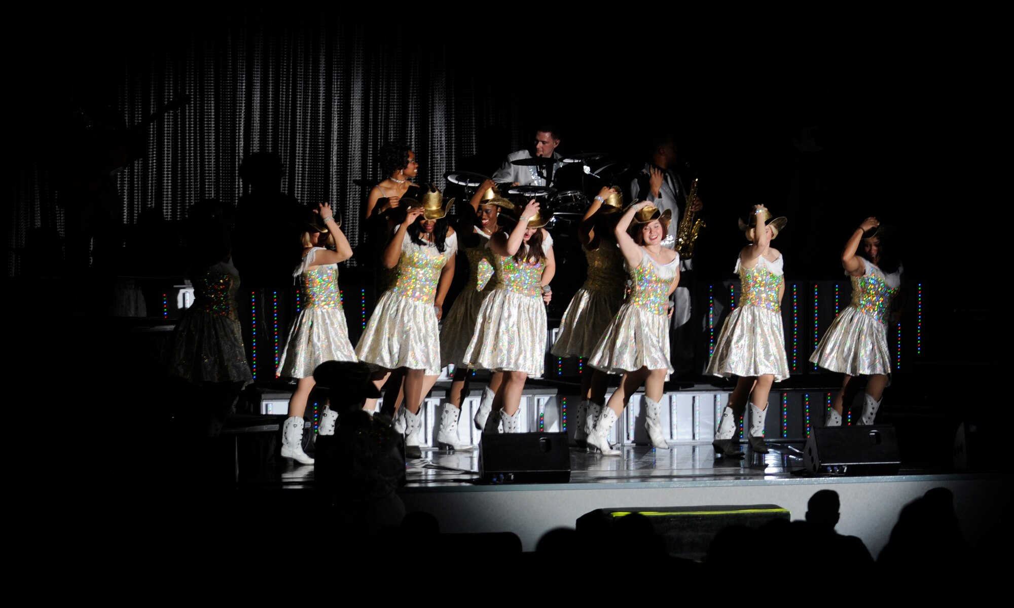 The ladies of the Tops in Blue 2012 World Tour perform a country number during a show Nov. 12, 2012, at Kunsan Air Base, Republic of Korea. For nearly 60 years, the Tops in Blue crew has traveled around the world to entertain and raise the moral of service members. (U.S. Air Force photo/Senior Airman Brigitte N. Brantley)