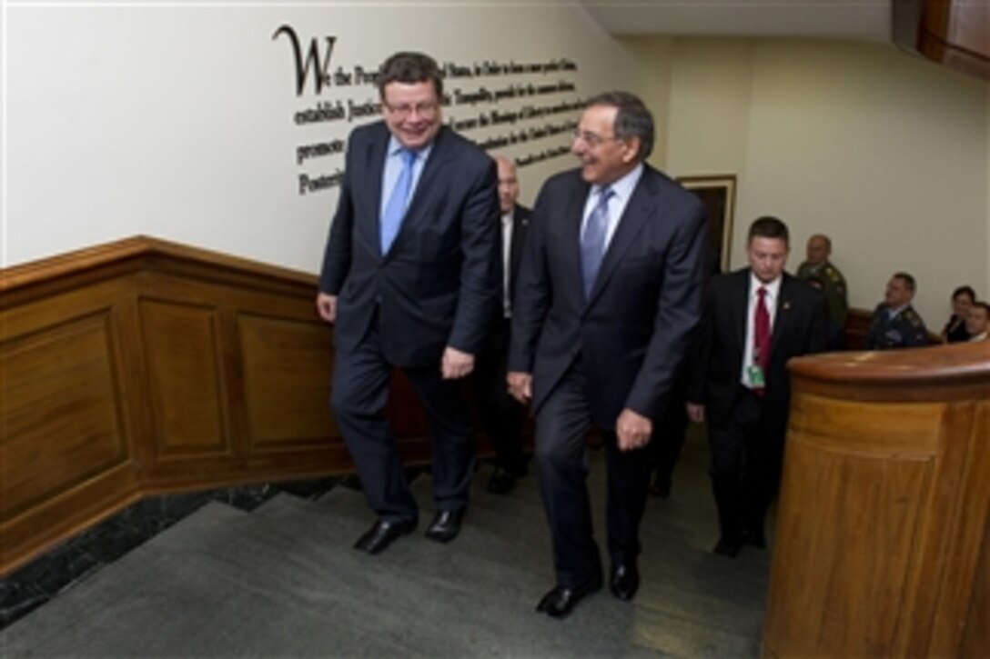 Secretary of Defense Leon E. Panetta, right, escorts Czech Republic Minister of Defense Alexandr Vondra to a meeting in the Pentagon, on Nov. 20, 2012.  Panetta and Vondra will meet to discuss national security items of interest to both nations.  
