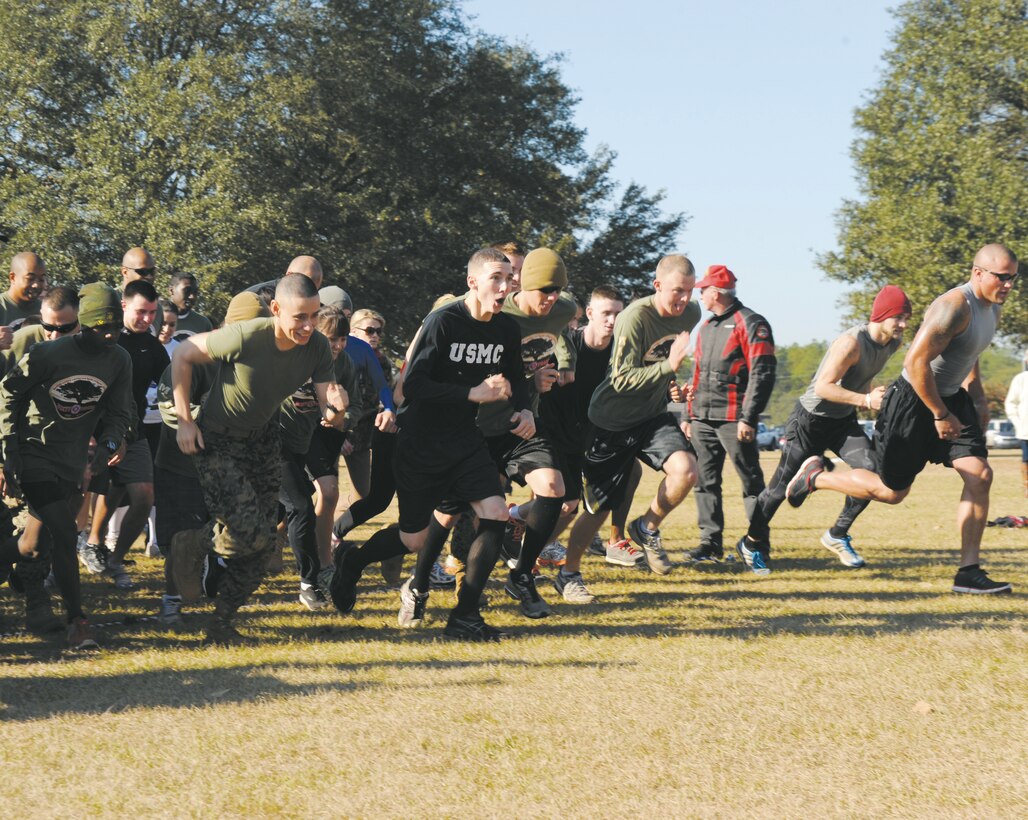 More than 550 people participated in Marine Corps Logistics Base Albany’s first Dirty Devil Dog Mud Run, Nov. 17. Sloshing through canals, jumping barricades and low crawling through mud pits were just a few of the obstacles runners endured. 