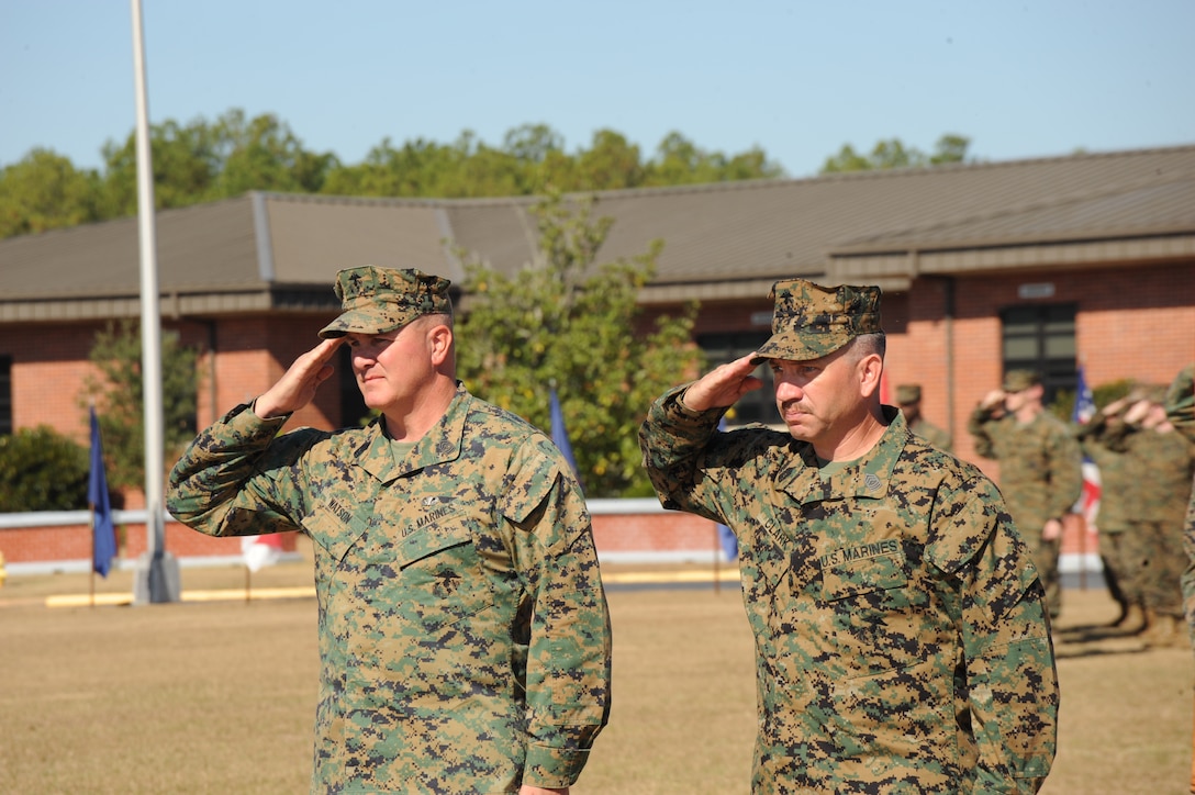 1st Sgt. James Watson, left, and Master Sgt. Mark Clark, both with Detachment 2, Supply Company, 4th Supply Battalion, retired from the Corps on its 237th birthday at Schmid Field here, Nov. 10.