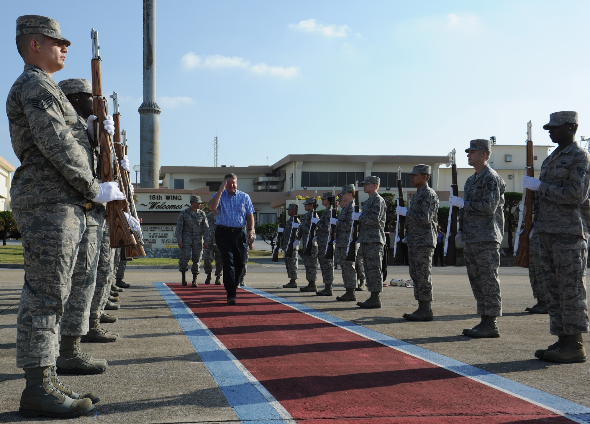 Kadena's honor guard members salute Secretary of the Air Force Michael Donley upon his departure from Kadena Air Base, Japan, Nov. 21, 2012. Donley visited with Kadena Shoguns as part of a multi-day tour to the Pacific. During his tour, Donley discussed budget concerns and other current events impacting the Air Force such as resent sexual misconduct at Basic Military Training. He also stressed the importance of preserving bilateral relations with allies in the Pacific region. (U.S. Air Force photo/Airman 1st Class Malia Jenkins)

