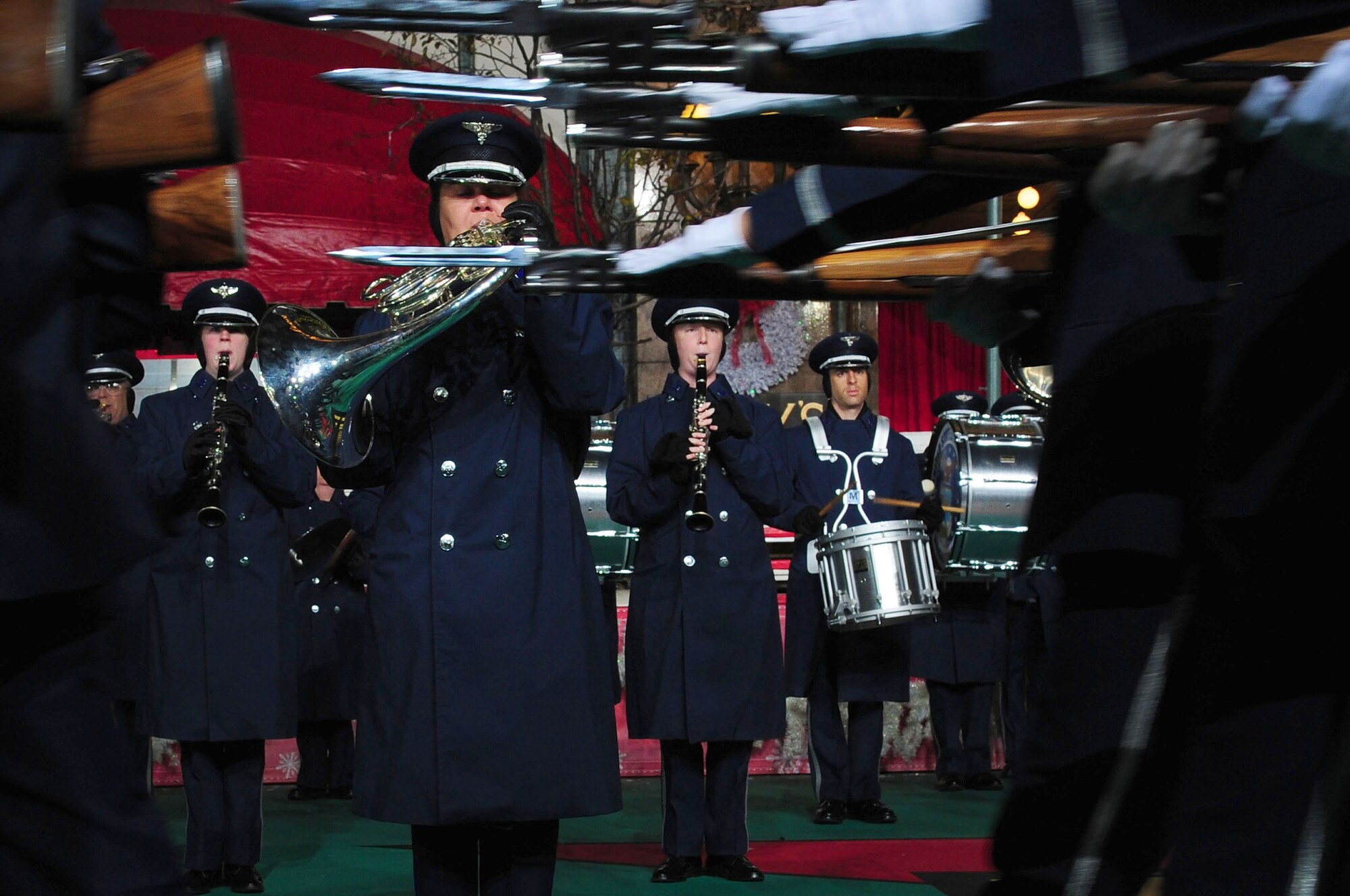The U.S. Air Force Band performs as the U.S. Air Force Honor Guard marches by during a rehearsal prior to the 86th Annual Macy?s Thanksgiving Day Parade at Herald Square, Nov. 22, 2012, in New York City. The USAF Honor Guard and Band made history when they set foot in New York City for the largest deployment of 11th Operations Group assets outside of the National Capital Region in support of the parade for the very first time. (U.S. Air Force photo by Senior Airman Steele C. G. Britton)