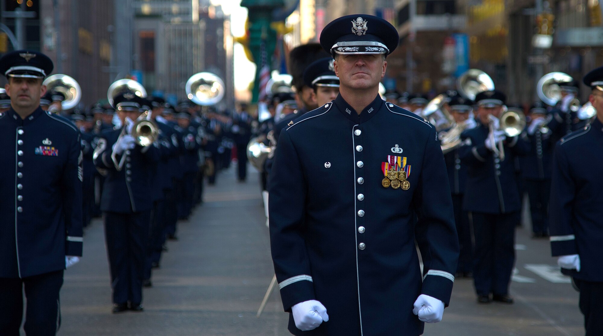 U.S. Air Force Band Commander Col. Larry Lang leads the USAF Band during the 86th Annual Macy's Thanksgiving Day Parade, Nov. 22, 2012, in New York City. Two hundred Airmen from the USAF Band and Honor Guard marched in the parade with a televised audience of 55 million viewers and live audience of more than three million spectators. (U.S. Air Force photo by Senior Airman Perry Aston)