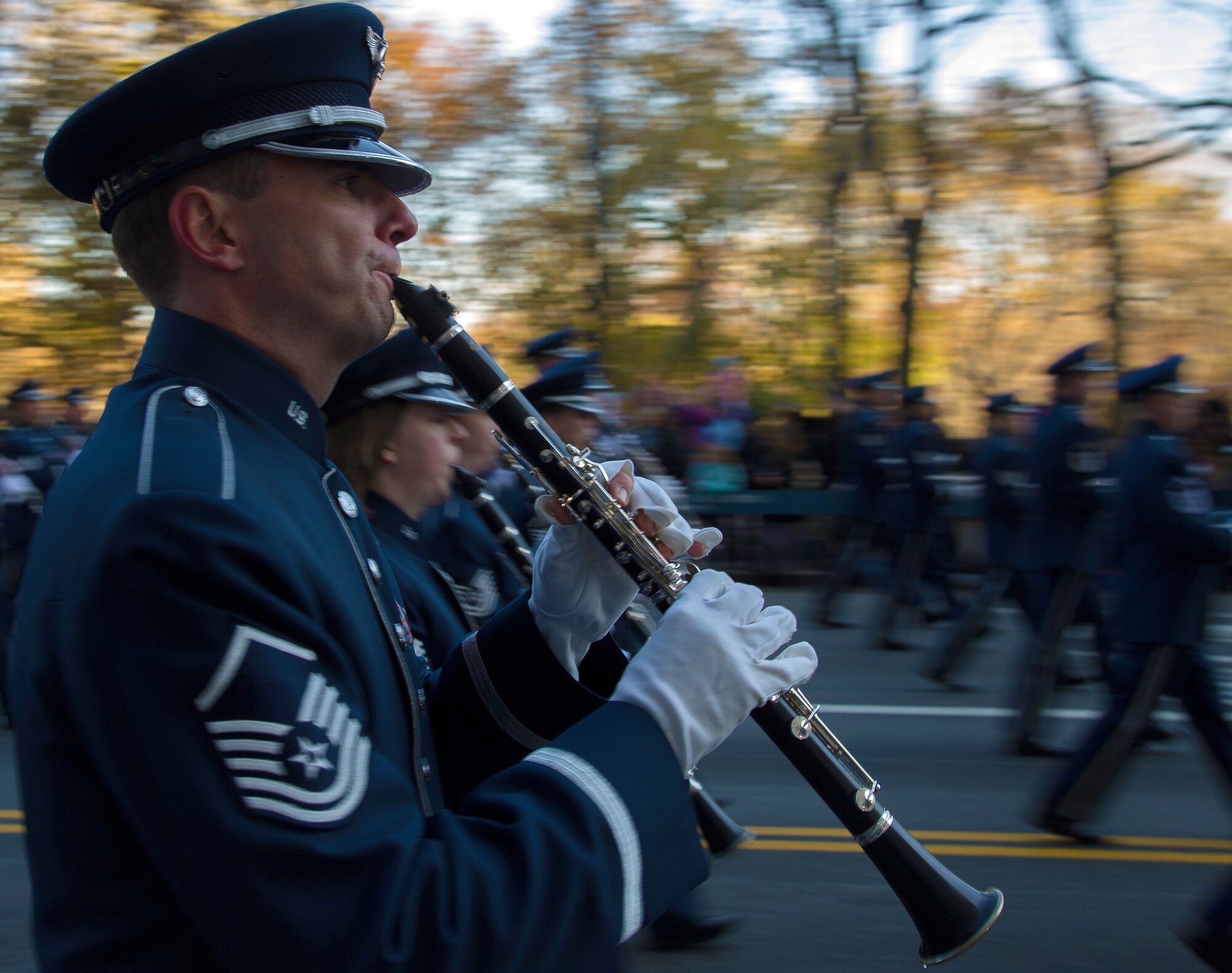 Master Sgt. Blake Aarington, U.S. Air Force Band clarinet player, performs with the band during the 86th Annual Macy's Thanksgiving Day Parade, Nov. 22, 2012, in New York City. Two hundred Airmen from the USAF Band and Honor Guard marched in the parade with a televised audience of 55 million viewers. (U.S. Air Force photo by Senior Airman Perry Aston)