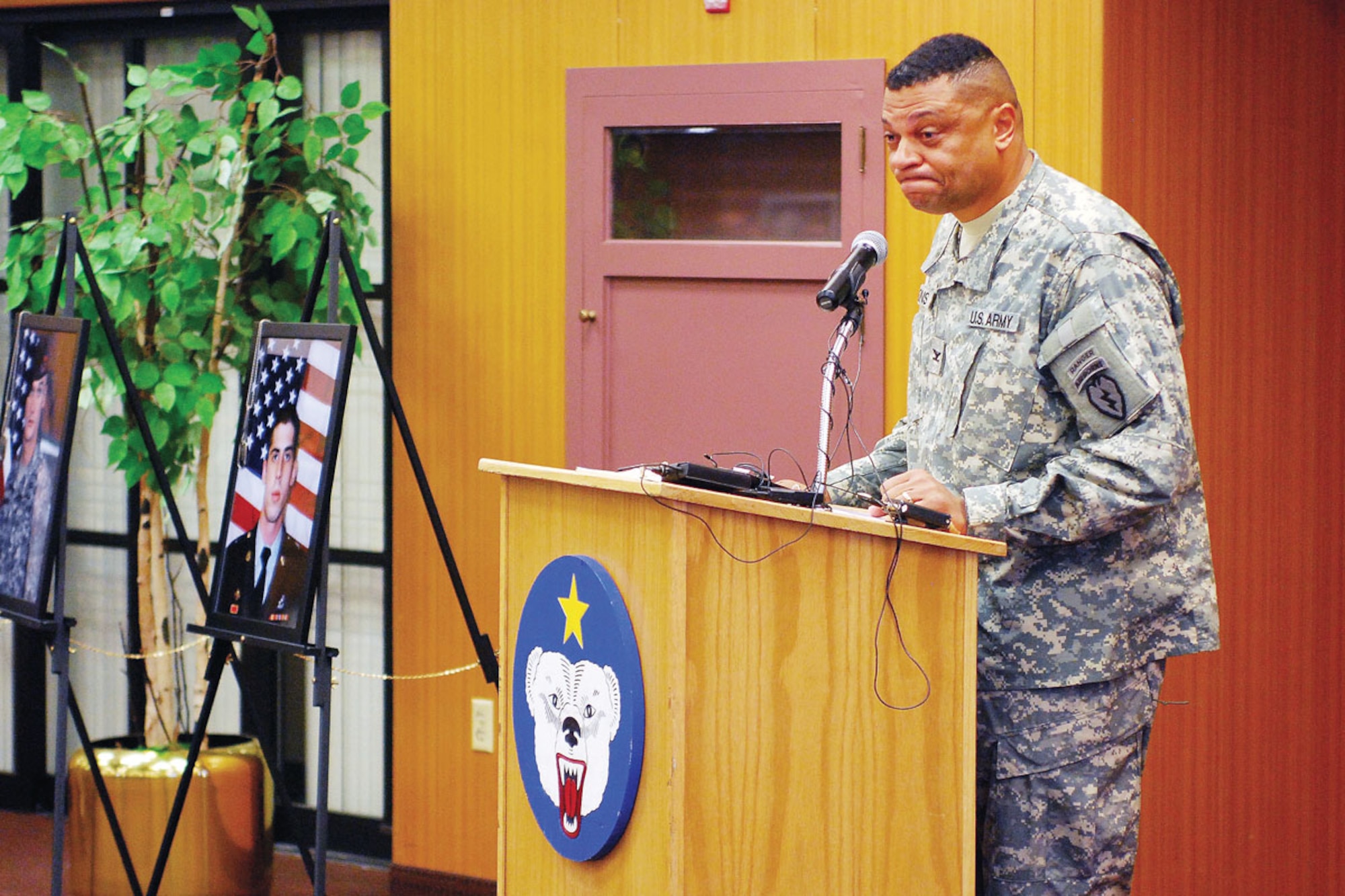 Army Col. Morris Goins, the commanding officer of the 4th Brigade Combat Team (Airborne), 25th Infantry Division, delivers a heartfelt speech during a memorial to honor the brigade’s fallen paratroopers, Nov. 16 at the brigade’s headquarters building at Joint Base Elmendorf-Richardson. The brigade commander and command sergeant major unveiled a monument honoring 14 soldiers who were killed in action during the brigade’s recent deployment to Afghanistan. (U.S. Army photo/Staff Sgt. Jeffrey S. Smith)