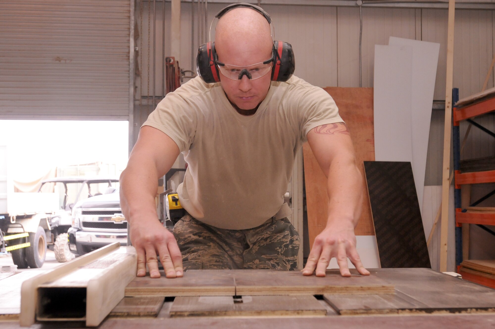 SOUTHWEST ASIA - U.S. Air Force Senior Airman Richard Klein, 380th Expeditionary Civil Engineer Squadron structural apprentice,cuts a piece of wood for a project Nov. 21, 2012.The 380th ECES structures shop is responsible for maintaining the operability and security of 380th AEW facilities, as well as performing renovations and construction projects within some of the facilities. (U.S. Air Force photo/Tech. Sgt. Amanda Savannah)
