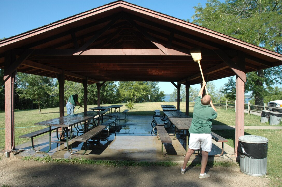 Volunteer cleaning picnic shelter