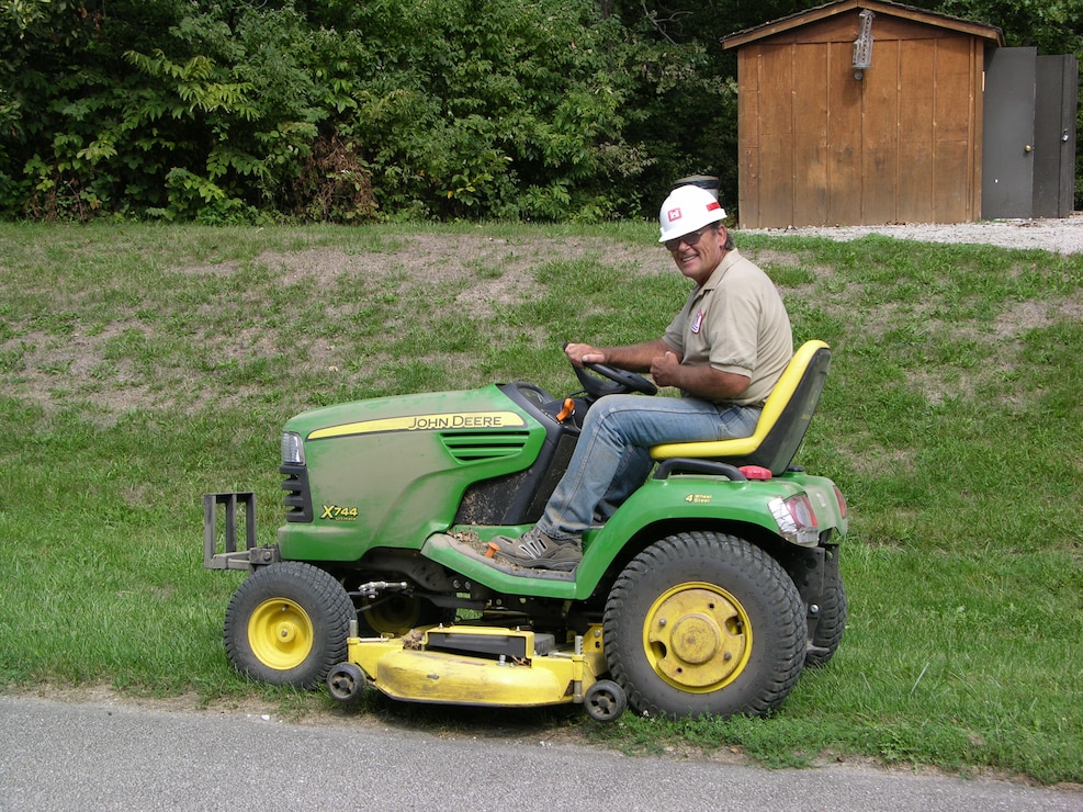 Volunteer mowing park