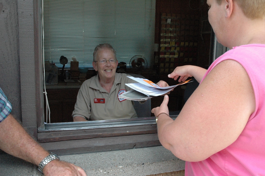 Volunteer Campground Host assisting campers