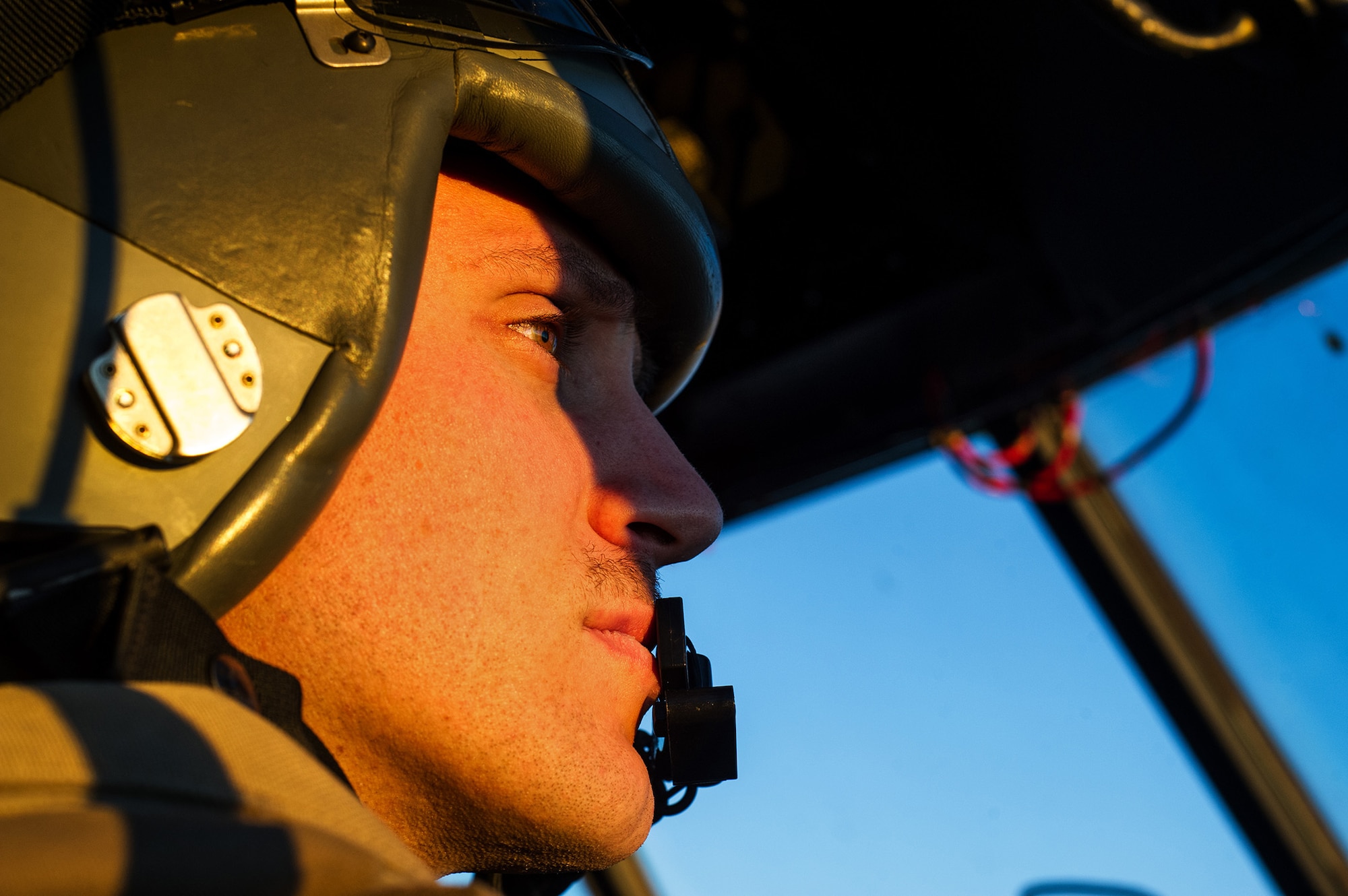 U.S. Air Force Capt. Sean Jacobson, 774th Expeditionary Airlift Squadron, co-pilot, flies a U.S. Air Force C-130H Hercules from Bagram Airfield, Afghanistan, Nov. 3, 2012. The 774th EAS provides tactical airlift, airdrop and aeromedical evacuation. creating an air bridge for personnel, equipment and supplies. Jacobson's hometown is Bakercity, Ore. (U.S. Air Force photo/Staff Sgt. Jonathan Snyder)
