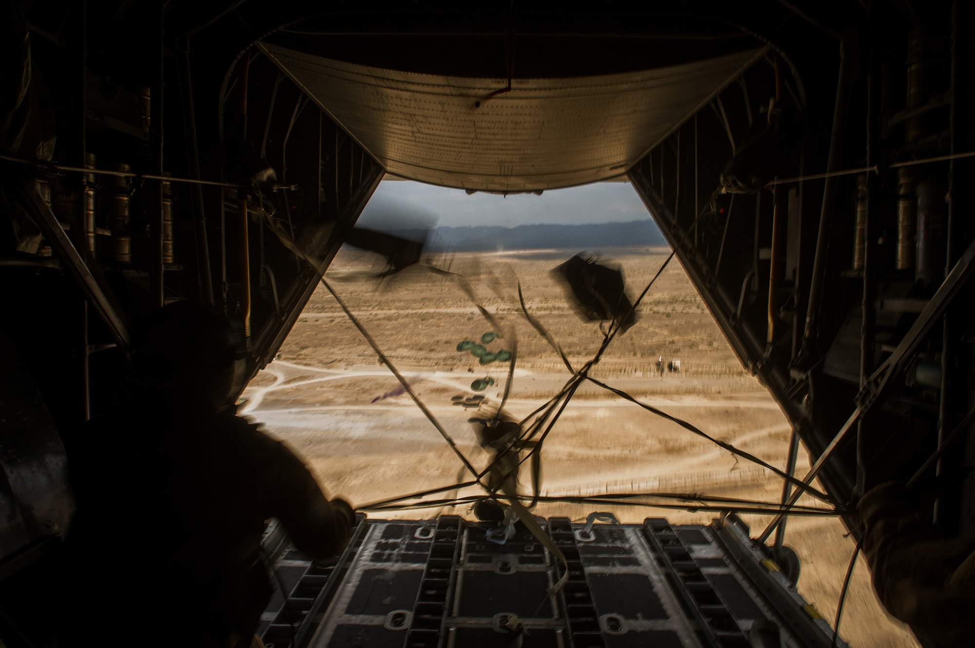 U.S. Air Force Staff Sgt. Jacob Barnes, 774th Expeditionary Airlift Squadron loadmaster, checks the pallets on a U.S. Air Force C-130H Hercules Oct. 31, 2012, from Bagram Airfield, Afghanistan. The 774th EAS provides tactical airlift, airdrop and aeromedical evacuation, creating an air bridge for personnel, equipment and supplies. Barnes' hometown is Tionesta, Pa. (U.S. Air Force photo/Staff Sgt. Jonathan Snyder)