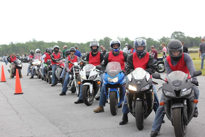 Contestants wait their opportunity to compete in a motorcycle skills rodeo at the annual Motorcycle Safety Awareness Month Kick-off Event.