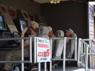 Marines participate in a safe driving simulator provided by North Carolina Governor's Highway Safety Program during a recent Operational Pause.