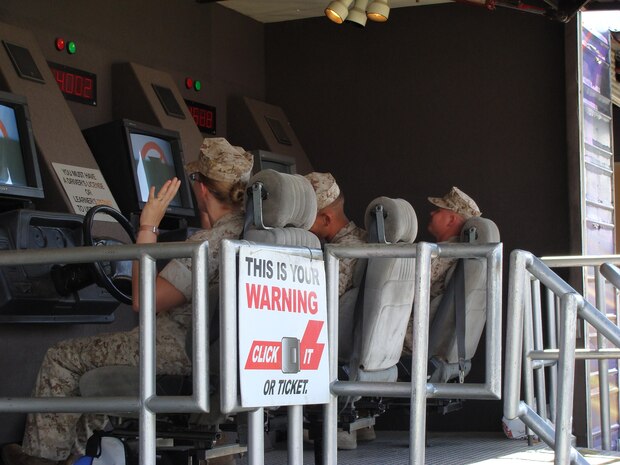 Marines participate in a safe driving simulator provided by North Carolina Governor's Highway Safety Program during a recent Operational Pause.