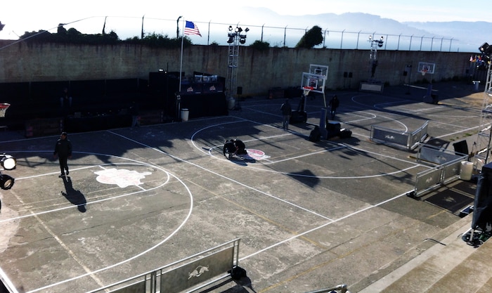 Staff members work to set up one of four basketball courts for the Red Bull King of the Rock 2012 basketball tournament on Alcatraz Island, Calif., Sept. 22, 2012. Seaman Sean M. Vincent, a corpsman with 2nd Dental Battalion, 2nd Marine Logistics Group, played in the contest after qualifying in July. 