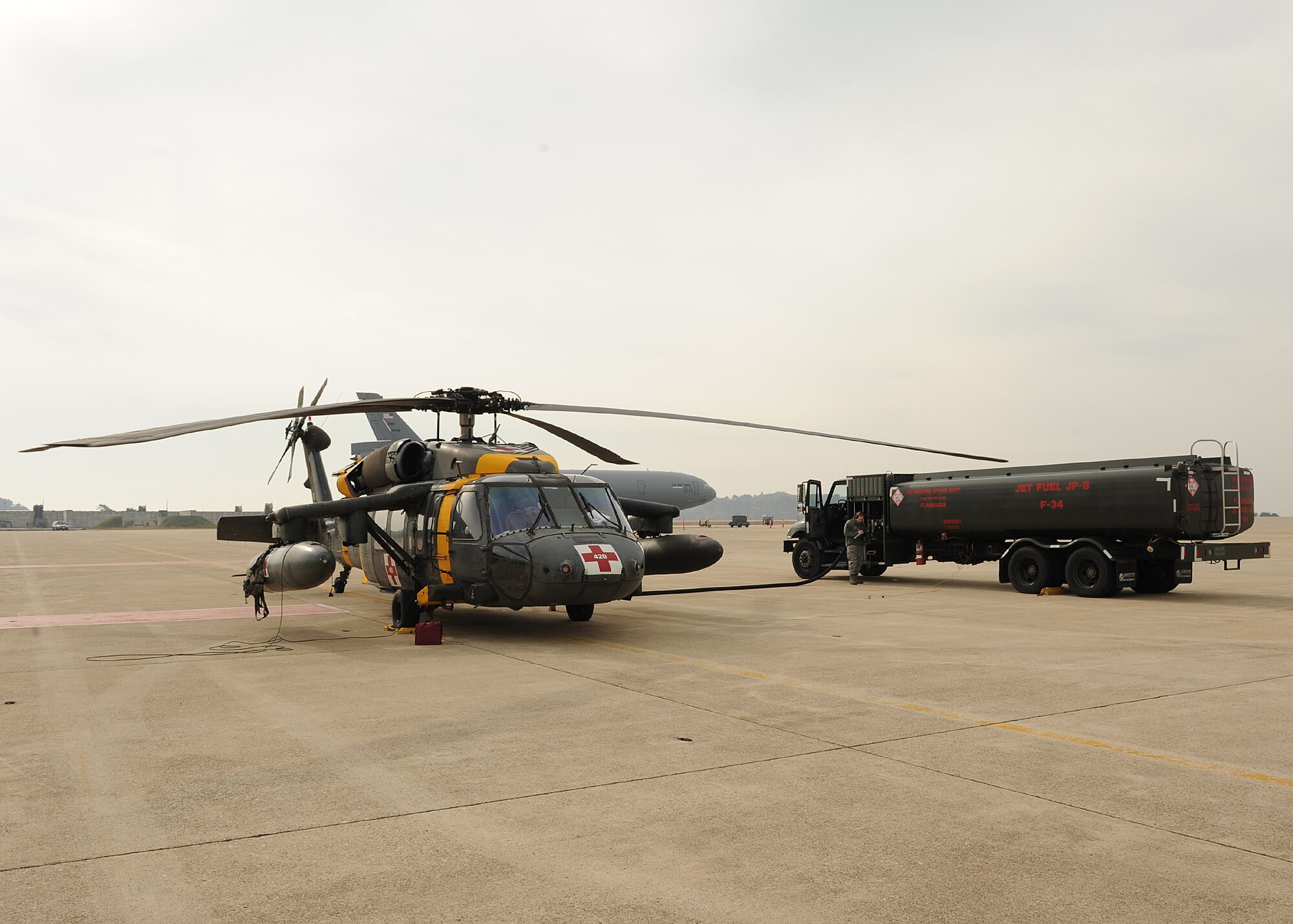A UH-60Q Black Hawk out of Camp Humphreys, Republic of Korea, gets refueled on Kunsan Air Base, ROK, Nov. 21, 2012. The Black Hawk was part of a medical evacuation training exercise which involved the US Air Force, US Army, US Navy and ROK Navy. (U.S. Air Force photo/Staff Sgt. Jonathan Fowler)