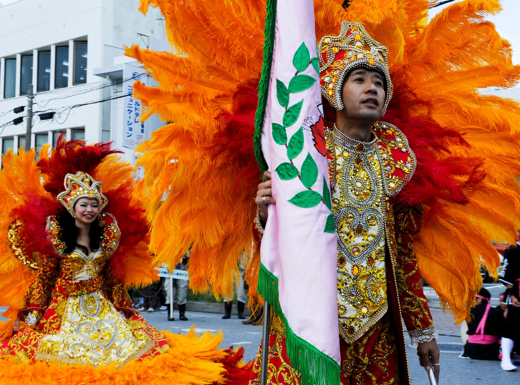 Members from the Okinawa Samba Carnival dance group display their costumes at the International Carnival at Gate 2 in Okinawa, Japan, Nov. 24, 2012. Samba is a Brazilian dance and musical genre originating in Bahia with its roots in Brazil (Rio de Janeiro) and Africa via the West African slave trade. It's also an African religious tradition and is considered to be one of the most popular Brazilian cultural expressions. (U.S. Air Force photo/Airman 1st Class Justin Veazie)