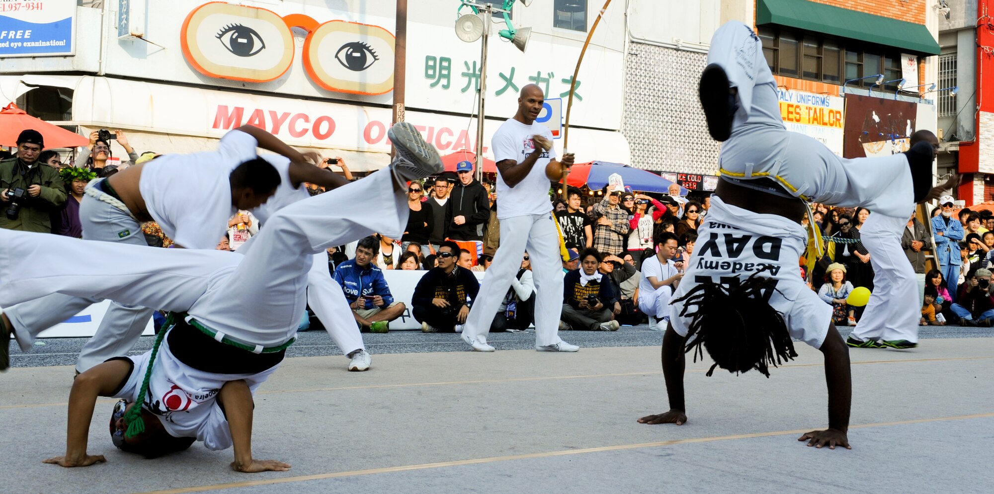 The Capoeira Academy in Okinawa performs during the International Carnival in Okinawa, Japan, Nov. 24, 2012. Capoeira is a Brazilian martial art that combines elements of dance and music. It was created in Brazil and is known for its quick and complex moves, using mainly power, speed, and leverage for leg sweeps. (U.S. Air Force photo/Airman 1st Class Justin Veazie)
