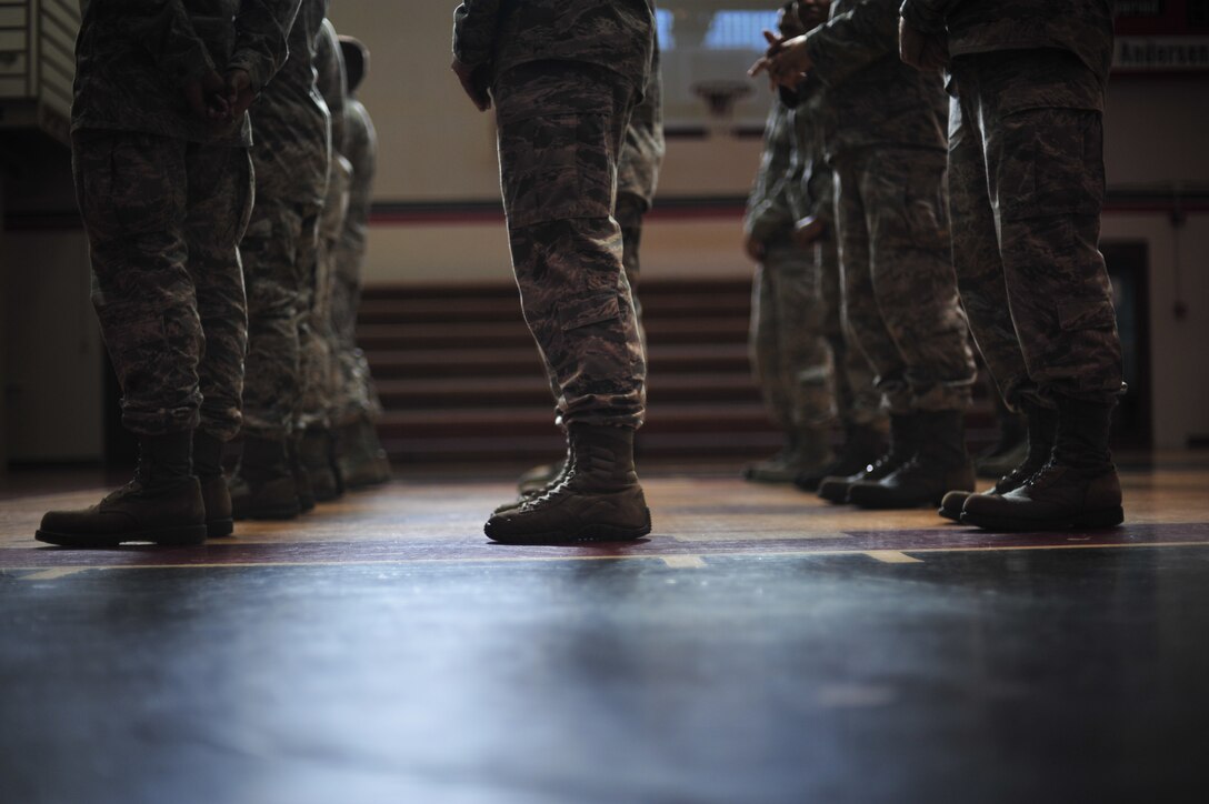 ANDERSEN AIR FORCE BASE, Guam-- Andersen Blue Knights Honor Guard members receive information on progress and upcoming events during their weekly training Nov 14. The base honor guard is a mandatory Air Force program and is the responsibility of the installation commander.  (U.S. Air Force photo by Staff Sgt. Alexandre Montes/Released)