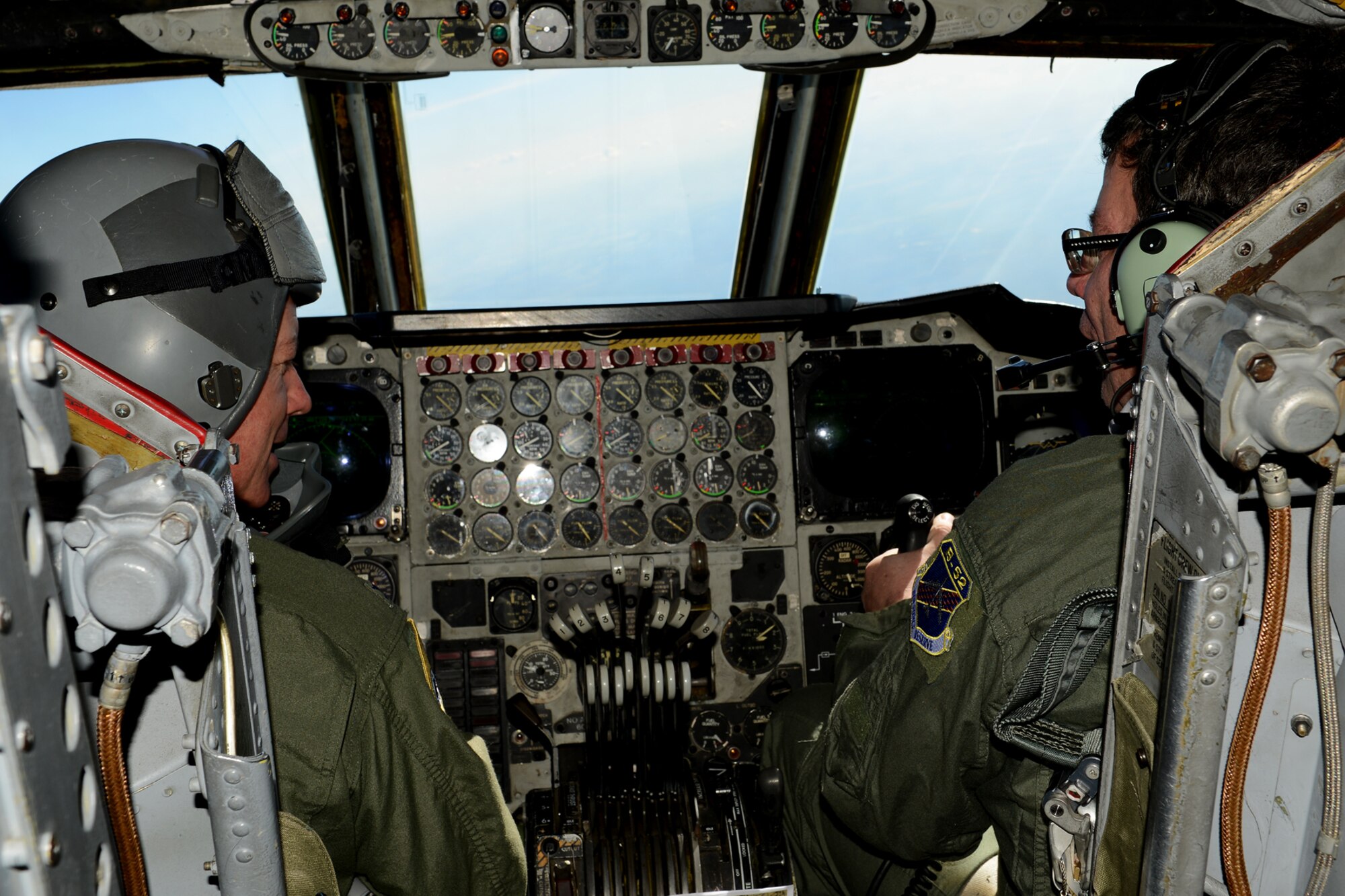 U.S. Air Force Col. Keith Schultz (left), 307th Operations Group commander, talks to Dr. Alexandr Vondra about the flying characteristics of the B-52H Stratofortress, Nov. 21, 2012, somewhere over Barksdale Air Force Base, La. Vondra is the Minister of Defense of the Czech Republic and was treated to an incentive flight on a 93rd Bomb Squadron B-52 during his visit to Barksdale. (U.S. Air Force photo by Master Sgt. Greg Steele/Release)