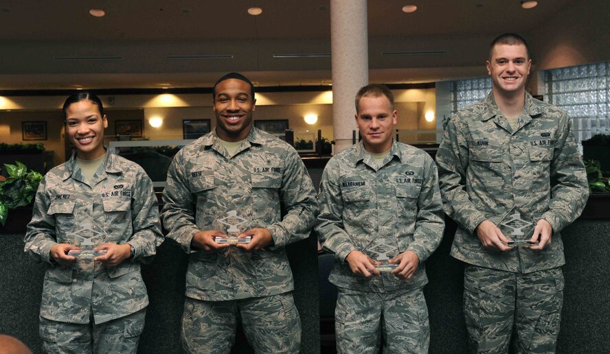November’s Diamond Sharp Award Recipients at Grand Forks Air Force Base, N.D., are (from left): Airman 1st Class Any Jimenez, 319th Civil Engineer Squadron; Airman 1st Class Robin Reese, 319th Medical Operations Squadron; Senior Airman Aaron Waaraniemi, 319th Operations Support Squadron; Airman 1st Class Ryan Kuhn, 319th Communications Squadron. (U.S. Air Force photo/Senior Airman Amber Bennett)