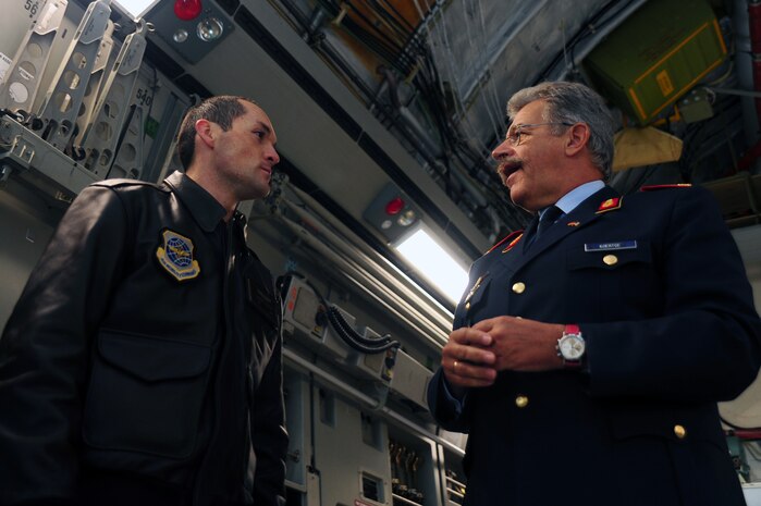 Brig. Gen. Hasso Koertge (right), commander of the German Armed Forces for United States and Canada, speaks with Staff Sgt. Robert Strecker, 14th Airlift Squadron instructor loadmaster Nov. 20, 2012, at Joint Base Charleston – Air Base, S.C. Koertge was at JB Charleston to observe the interaction of Maj. Sebastian Demitz, a German exchange pilot assigned to the 14th AS and the 437th Airlift Wing and to learn how he was being utilized on missions. (U.S. Air Force photo/ Airman 1st Class Chacarra Walker)