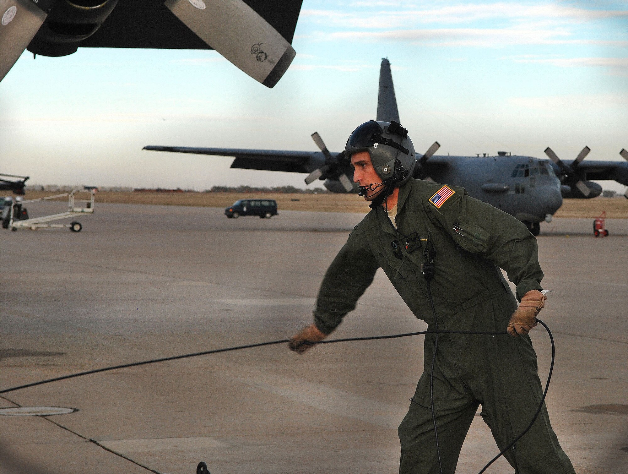 U.S. Air Force Senior Airman Aaron Hayes, 16th Special Operations Squadron, helps prepare an AC-130H Spectre gunship prior to departure at Cannon Air Force Base, N.M., Nov. 8, 2012. The flight was part of a routine training mission conducted over White Sands Missile Range, N.M., in coordination with coalition forces both on the ground and in the air. (U.S. Air Force photo/Desiree Ann Montenegro)