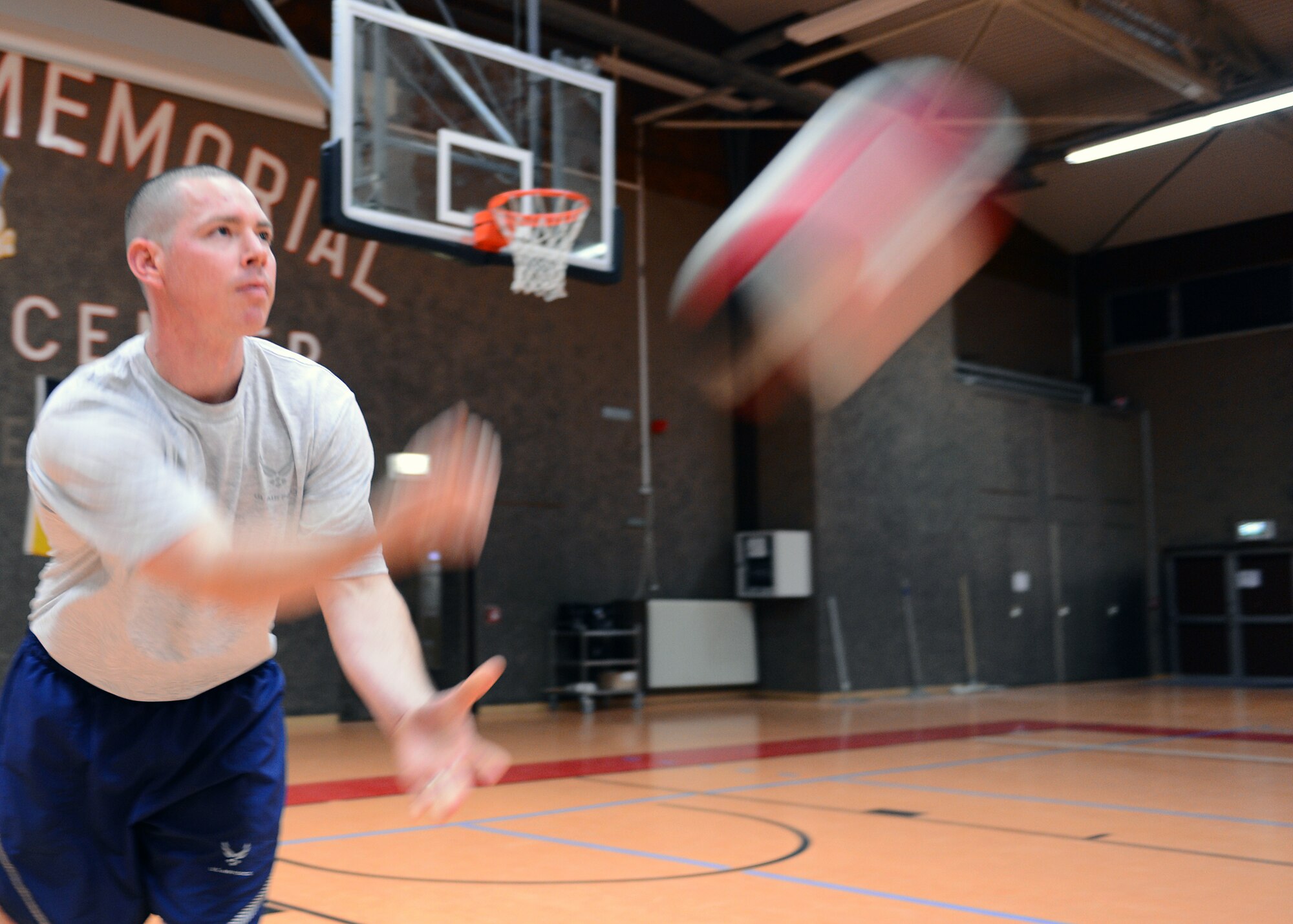 SPANGDAHLEM AIR BASE, Germany – U.S. Air Force Senior Airman Chauncey Lawson, 52nd Maintenance Operations Squadron, serves during the 52nd Force Support Squadron Airman Leadership School student versus first sergeant volleyball game at the Skelton Memorial Fitness Center Nov. 21. Lawson is part of the ALS Globemaster flight and had to communicate on the fly with his flight members, many of whom had never played volleyball together. The strategic objective of the match, apart from encouraging morale, is to test the students’ ability to work together against a seasoned first sergeant team. (U.S. Air Force photo by Staff Sgt. Daryl Knee/Released)