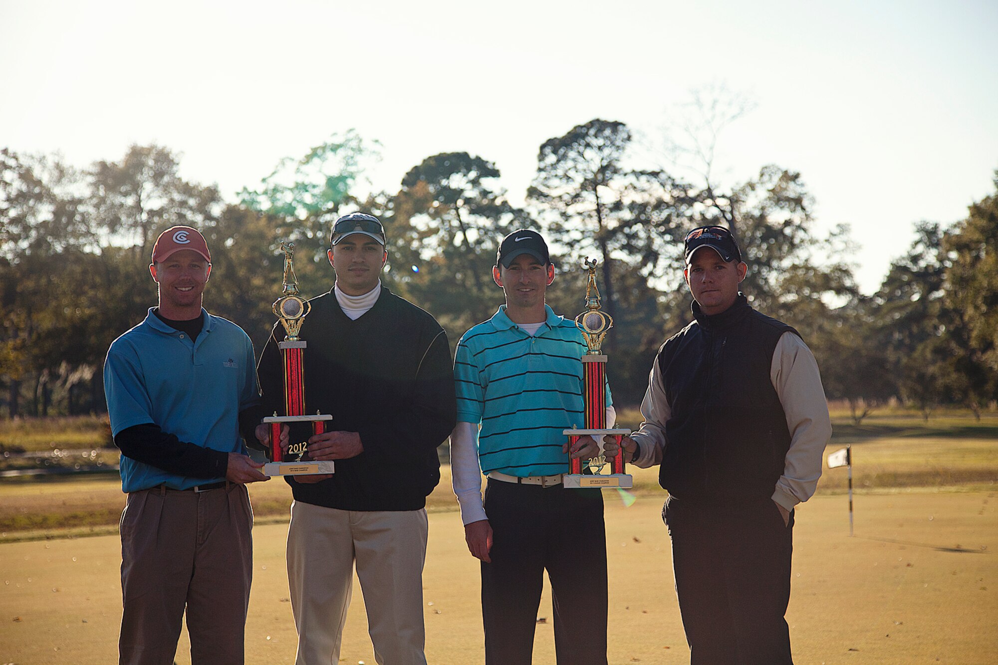 11/05/2012 – Staff Sgt. David Corter, Staff Sgt. Vincent Bustillo, Staff Sgt. Brandon Edwards and Staff Sgt. Brandon Brown, all assigned to the 628th Security Forces Squadron, accepted their trophies for the 2012 Intramural Golf Season and Playoff championship Nov. 5, 2012, at Wrenwoods Golf Course at Joint Base Charleston – Air Base, S.C. The 628th SFS won the intramural golf season and came out on top against the 437th Aerial Port Squadron during the championship. Players from the  628th Communications Squadron, 628th Civil Engineer Squadron, 373rd Training Squadron, 628th SFS, 1st Combat Camera Squadron, 437th APS, 437th Maintenance Squadron and 14th Airlift Squadron participated in the golf league. (Courtesy photo) 


