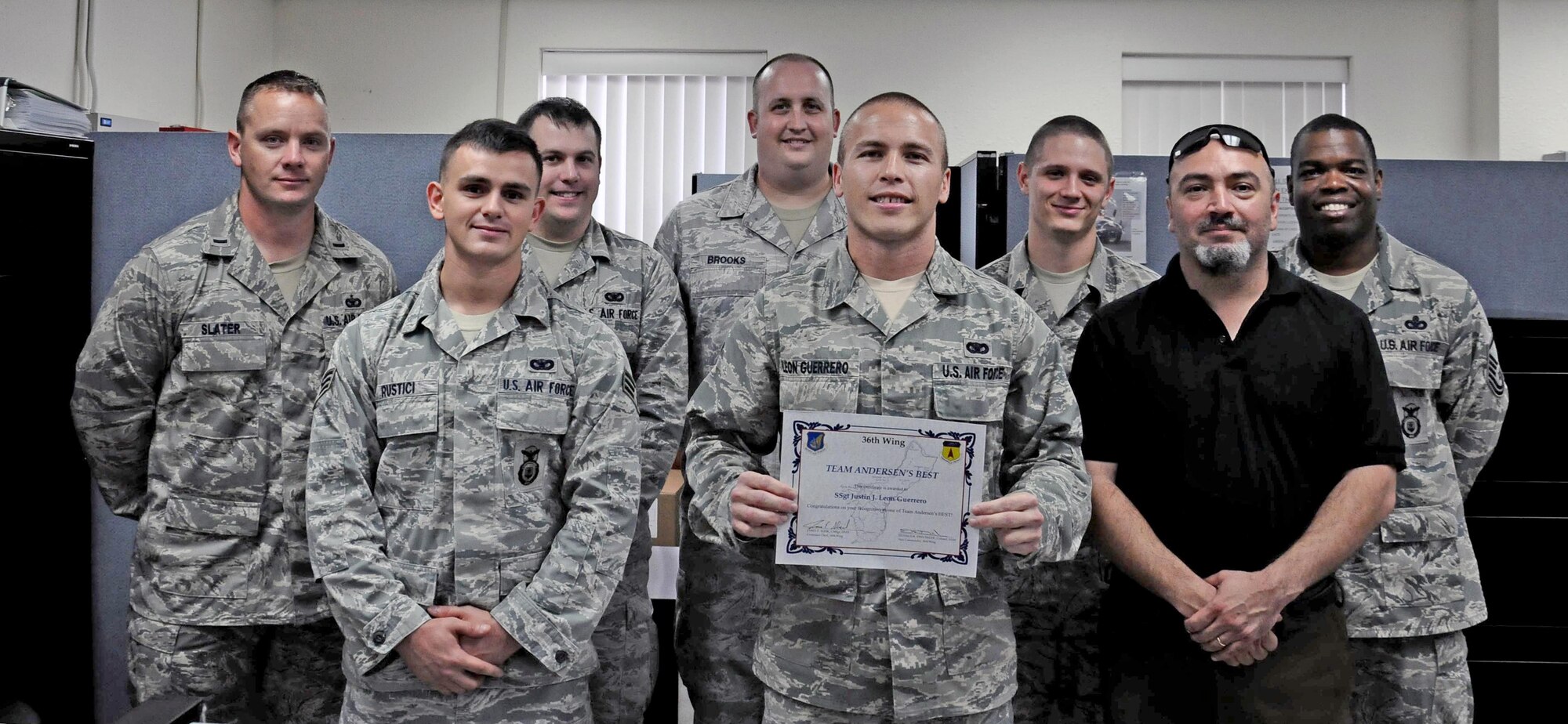 ANDERSEN AIR FORCE BASE, Guam-- Staff Sgt. Justin Leon Guerrero, 36th Security Forces Squadron noncommissioned officer in charge of the visitor control center, was awarded Team Andersen’s Best, here, Nov. 15. Team Andersen's Best is a recognition program which highlights a top performer from the 36th Wing. Each week, supervisors nominate a member of their team for outstanding performance and the wing commander presents the selected Airman or civilian with an award.(U.S. Air Force photo by Airman 1st Class Mariah Haddenham/Released)
