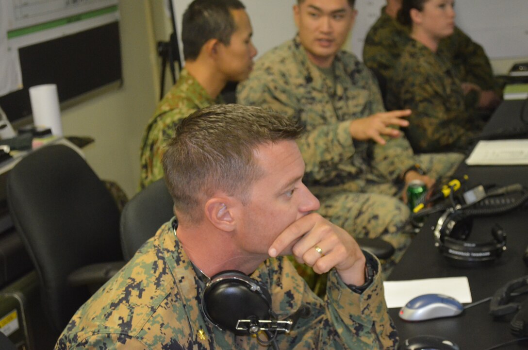 121121-M-TR505-365

CAMP HANSEN, Okinawa, Japan – Maj. David Adamiec takes part in a Watch Officer, Watch Chief and Battle Staff Training Course here Nov. 14-21.  The course is provided by the Marine Air-Ground Task Force Integrated Systems Training Center and designed to improve unit readiness and ability to respond to contingencies in the Asia-Pacific.  This will allow Marines with the 3rd MEB and members of the Japan Ground Self-Defense Force to more effectively command and control forces assigned to them in the event of a crisis or contingency. Adamiec is the Air Operations Officer with the 3rd MEB.
