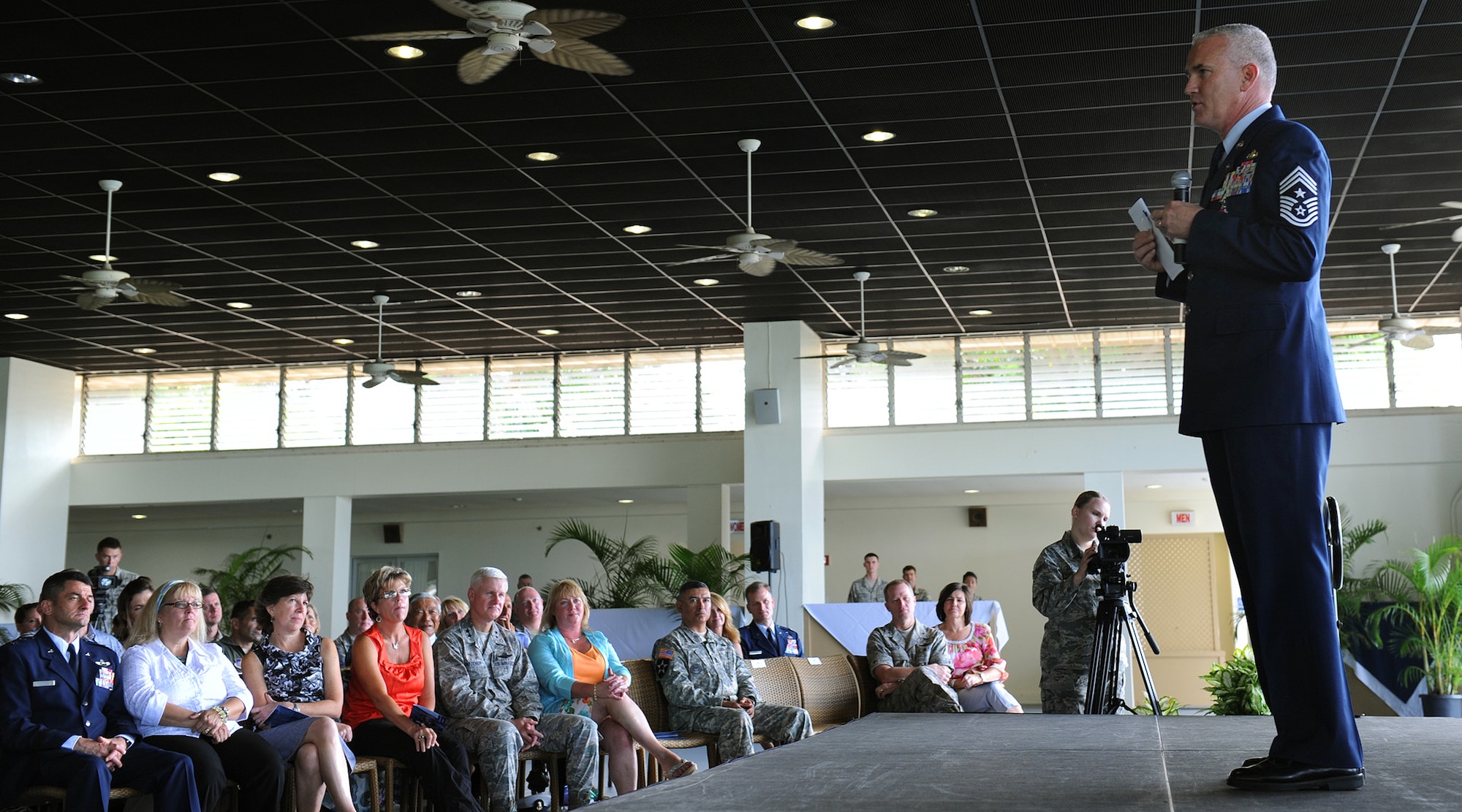 Chief Master Sgt. Brooke McLean, Pacific Air Forces command chief, addresses a crowd at the Officer’s Club Lanai, Joint Base Pearl Harbor-Hickam, Hawaii, during his retirement ceremony on Nov. 16, 2012. McLean retires after 30 years of military service. (U.S. Air Force photo/Tech. Sgt. Jerome S. Tayborn/Released)