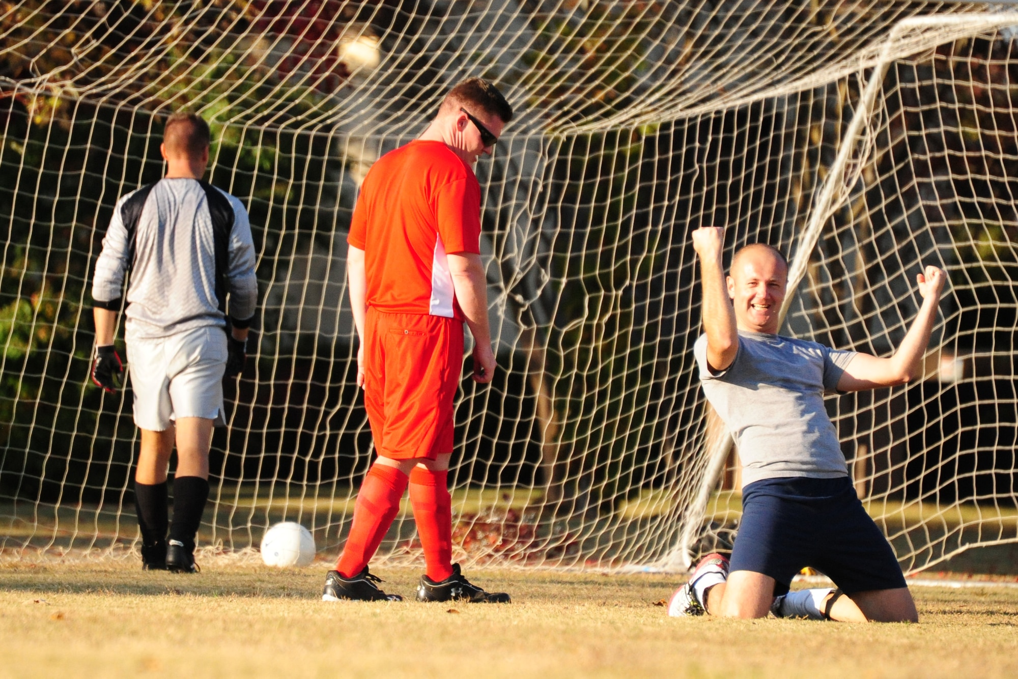 International Officer School Student Igorcho Stoimenovski celebrates after scoring his second goal during a friendly match of soccer against the Squadron Officer School instructors on Nov. 16. In the end, IOS proved too much for SOS as they won with a score of 6-2. (U.S. Air Force photo by Senior Airman Christopher Stoltz)