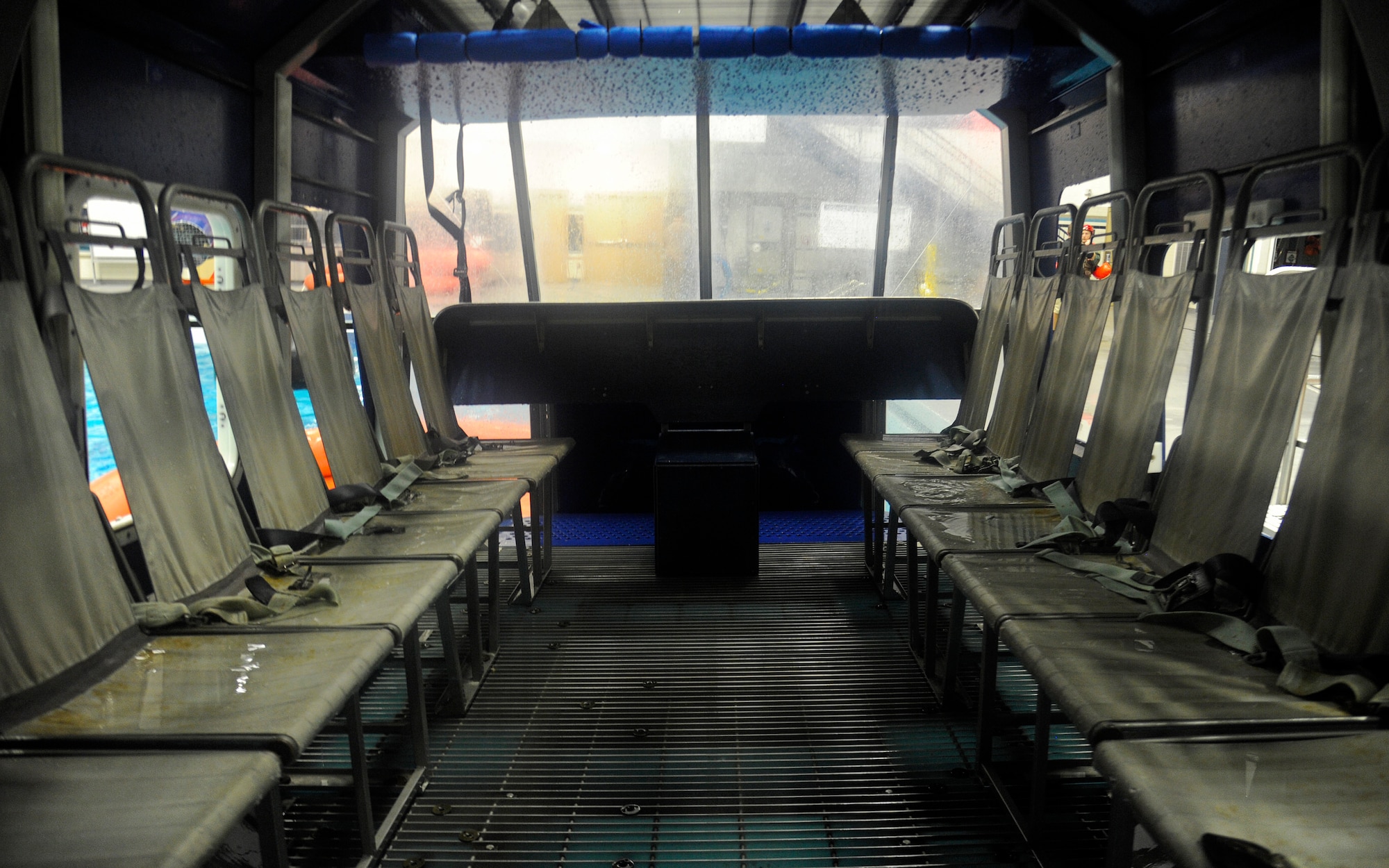 An interior view of the Modular Euriess Training System in the aquatics center at Fairchild Air Force Base, Wash., Oct. 12, 2012. Survival, Evasion, Resistance and Escape students strap in as it is lowered into the pool. (U.S. Air Force photo by Airman 1st Class Ryan Zeski)