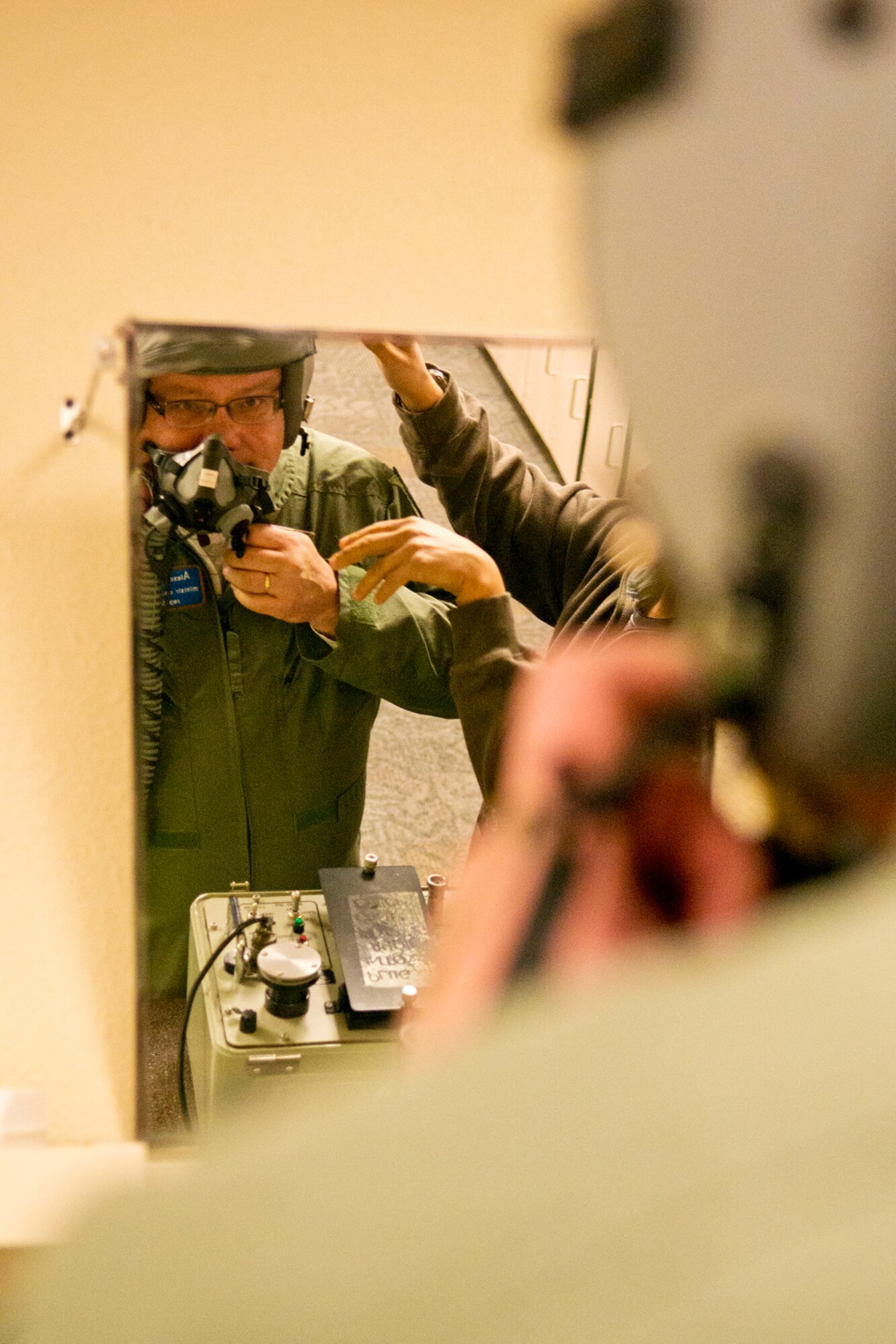 Dr. Alexandr Vondra is fitted with a helmet and oxygen mask prior to an incentive flight on a 93rd Bomb Squadron B-52H Stratofortress, Nov. 21, 2012, Barksdale Air Force Base, La. Vondra is the Minister of Defense of the Czech Republic and received a tour of Barksdale. (U.S. Air Force photo by Master Sgt. Greg Steele/Released)