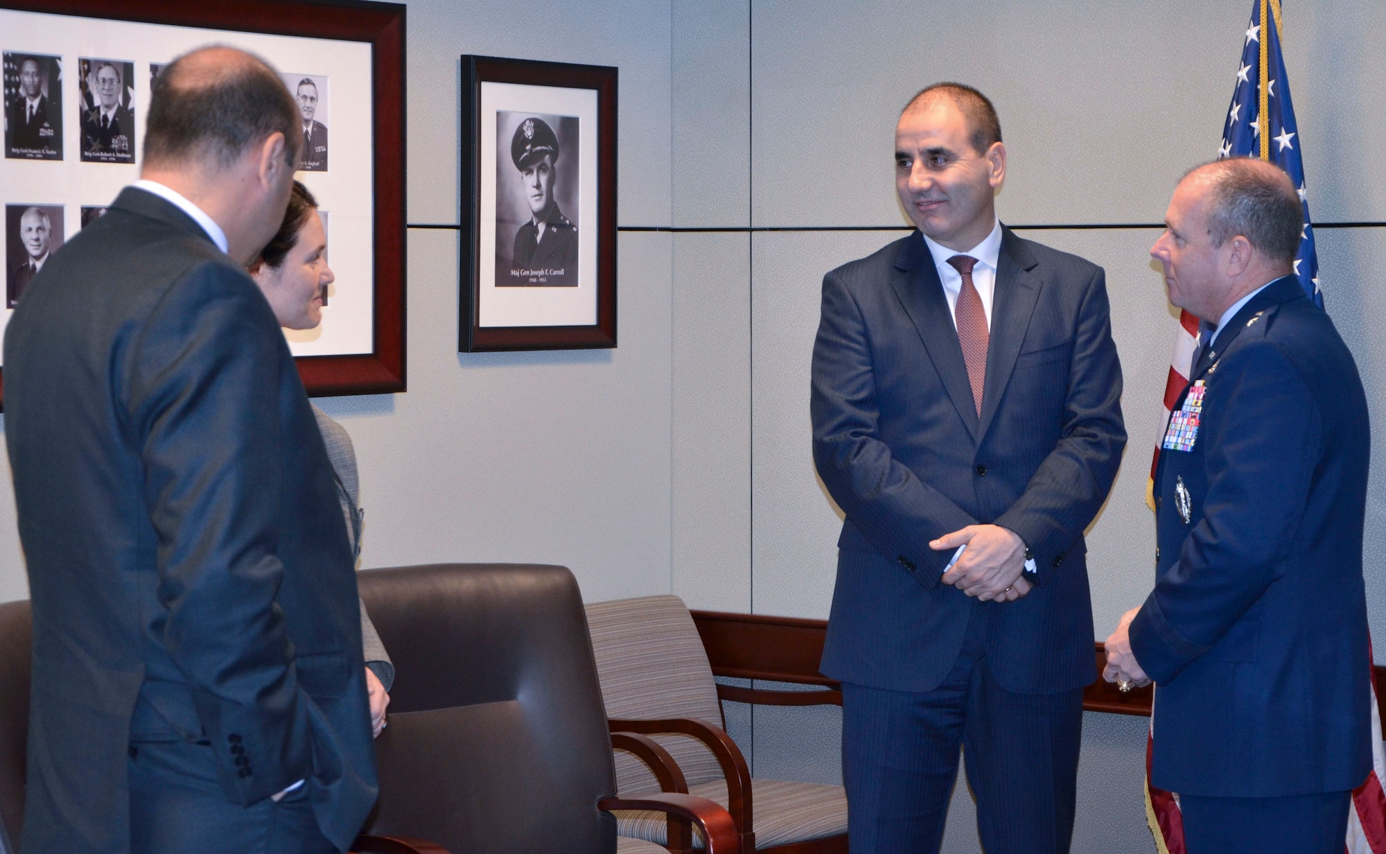 Mr. Tsvetan Tsvetanov, Bulgarian deputy prime minister, center, visits with Air Force Office of Special Investigations members during his visit to the OSI headquarters November 27. Brig. Gen. Kevin Jacobsen, right, spent some time with the Bulgarian official during his visit. (U.S. Air Force photo by James C. Dillard)