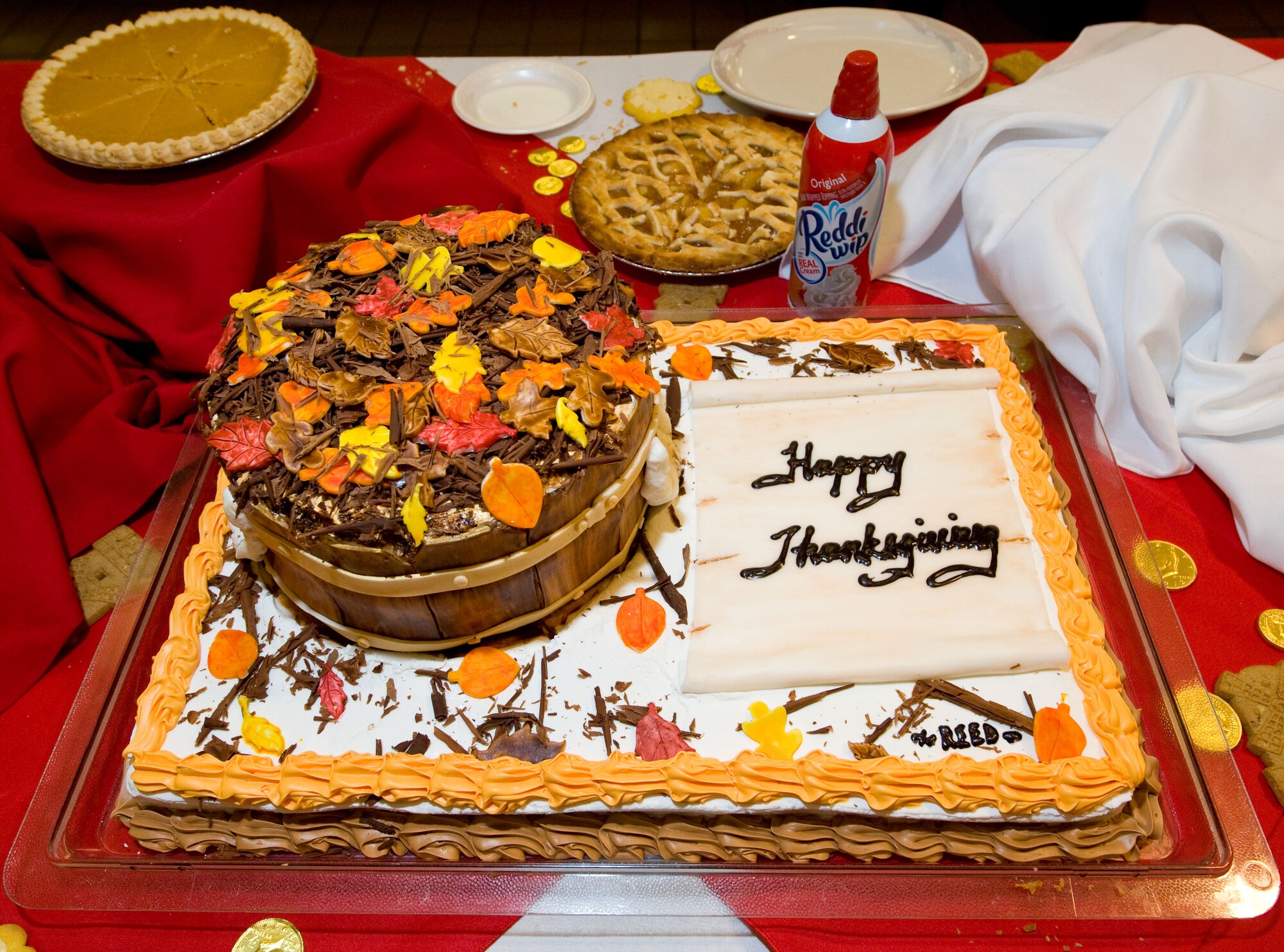 Culinary talents were on display during the Thanksgiving meal served at the Patterson Dining Facility on Dover Air Force Base, Del. on Nov. 22, 2012. Here, a sheet and round cake, created by Airman 1st Class Jerome Reed,  take on the appearance of a fall scene. (U.S. Air Force photo by Greg L. Davis)