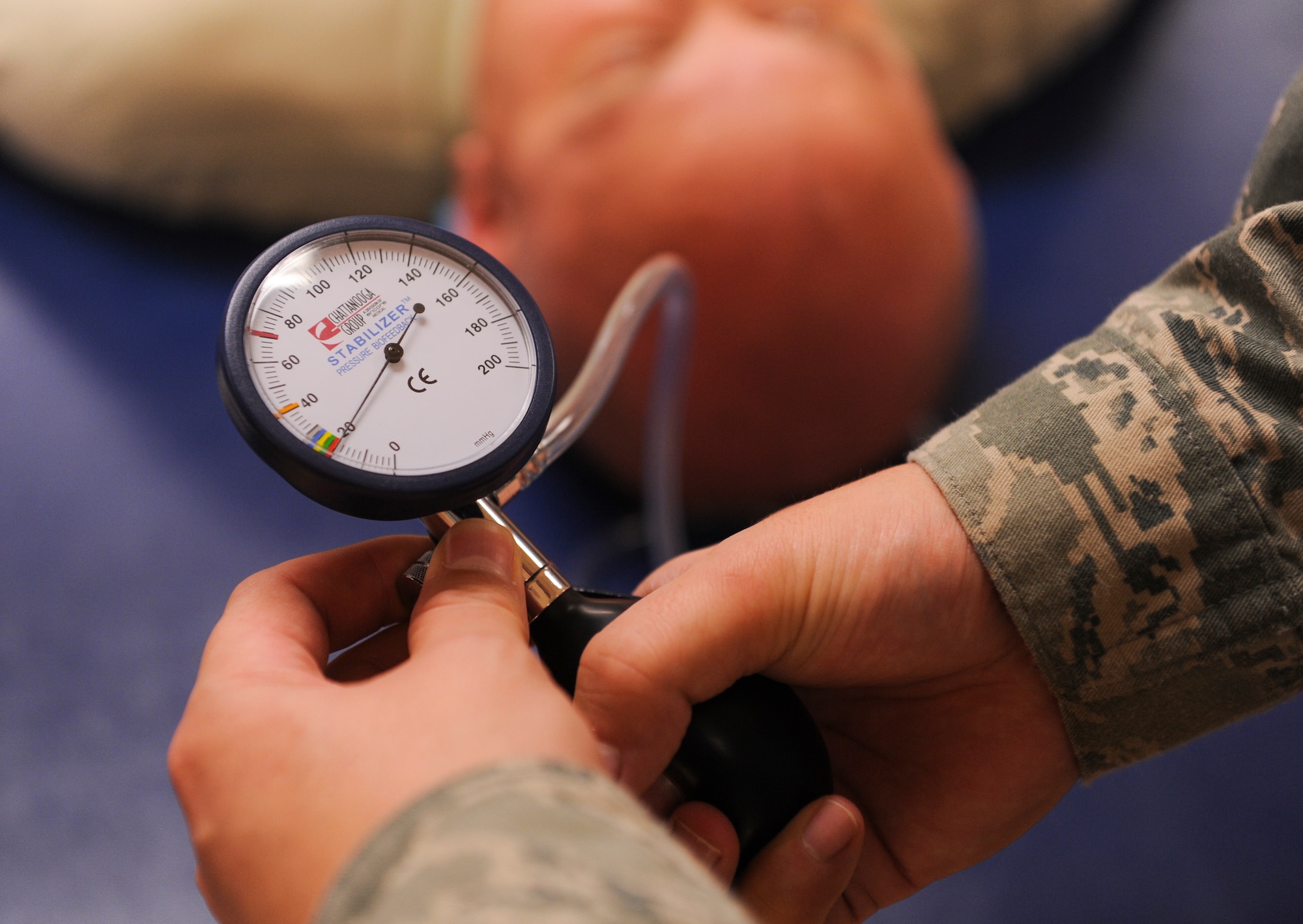 Staff Sgt. David Pienta, a 19th Medical Operations Squadron physical medicine technician, uses a bio feedback unit on a patient Nov. 7, 2012, at Little Rock Air Force Base, Ark. The bio feedback unit helps retrain weakened muscles. (U.S. Air Force photo by Airman 1st Class Rusty Frank)